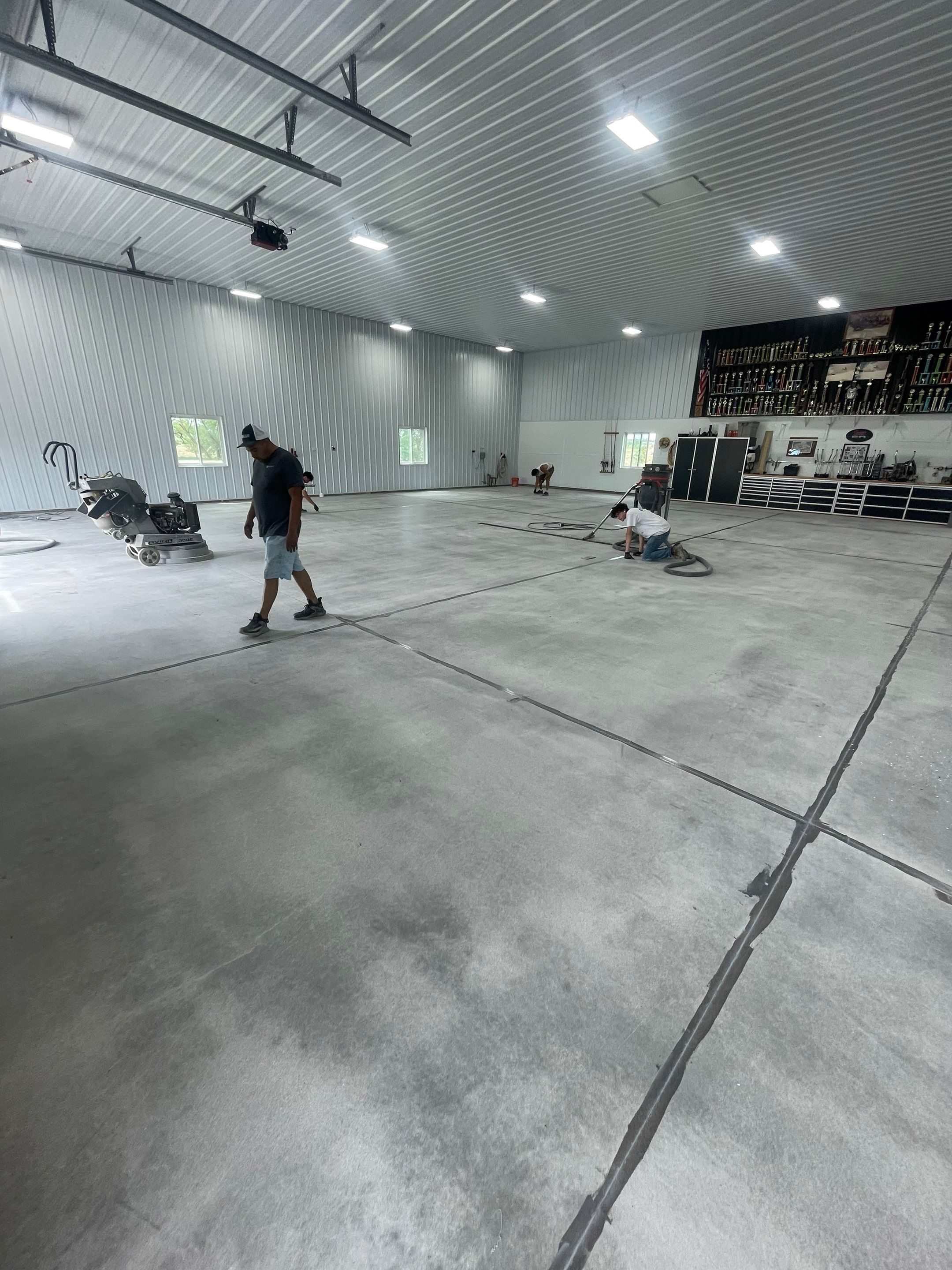 Multi-Stage Concrete Floor Coating for Egan Shop and RV Storage by Select Painting, Coatings & Garage Cabinets