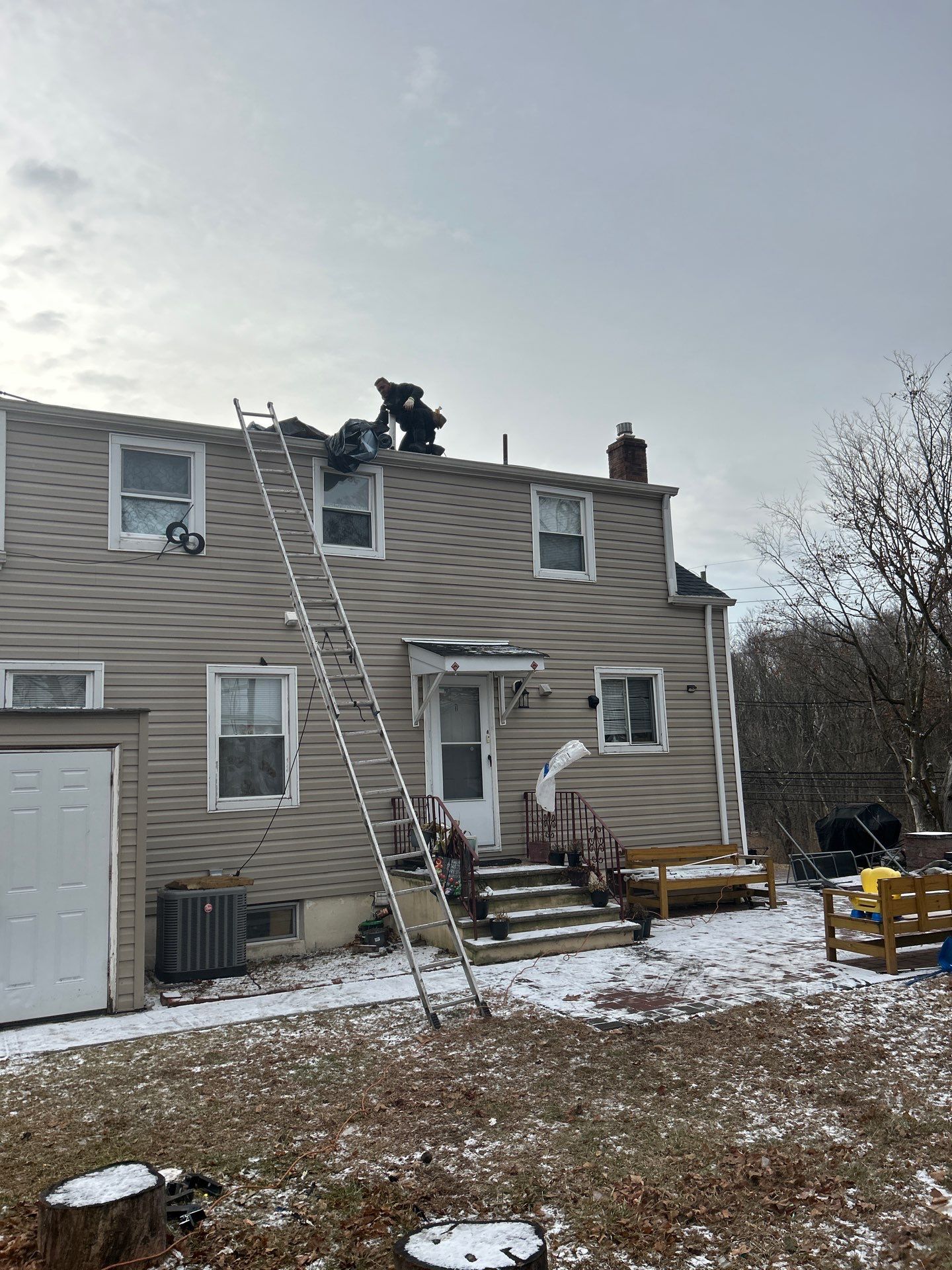 Estate Gray Shingles by Reimagine Roofing