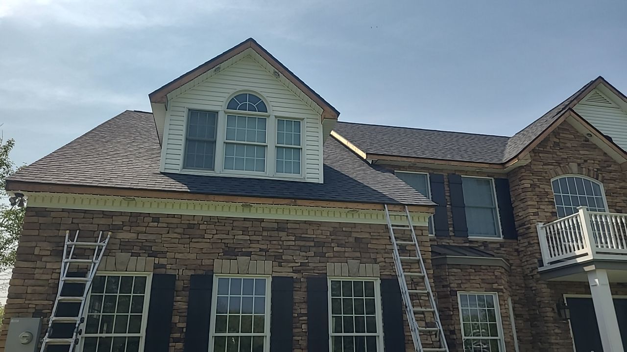 Roof Damage using Certainteed Lifetime Roofing System- Moire Black Landmark Pro shingkes with shadow ridge caps. by BulletpROOF Exteriors