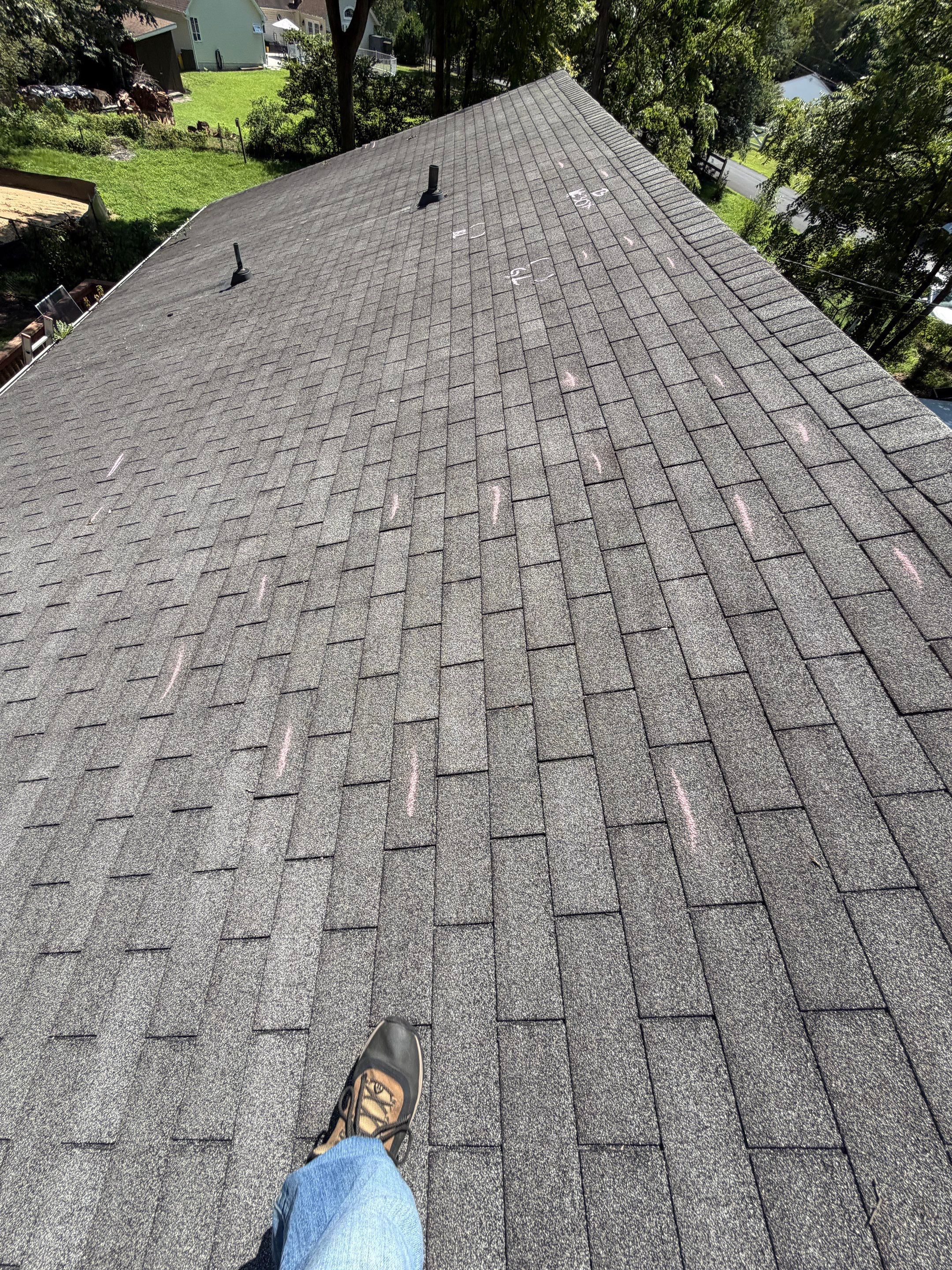 Full Roof Replacement and Gutter Guard Installation in Pasadena, Maryland by First Chesapeake Roofing