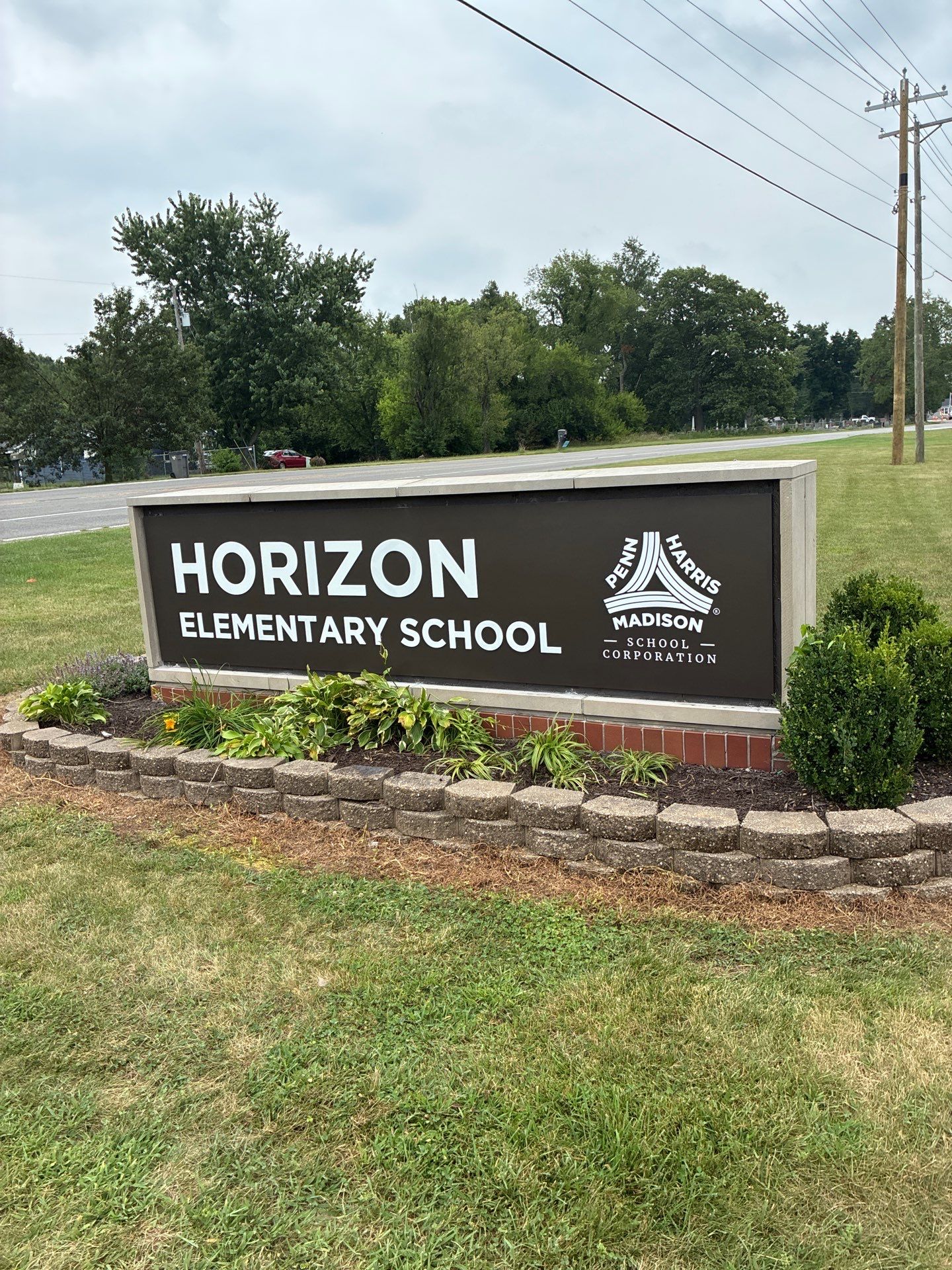 Horizon Elementary School Monument Signage and Retaining Wall Installation by Hayes Design co