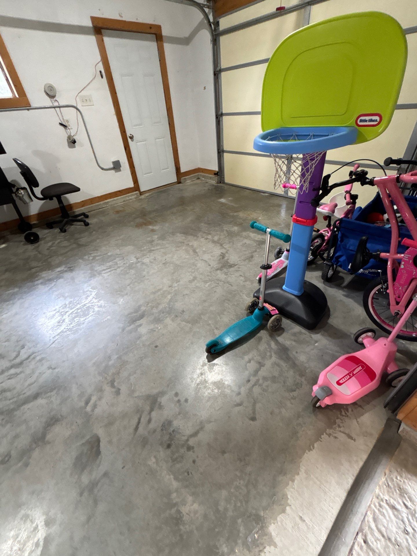 Gray and Black Speckled Polyurea Garage Floor in Dell Rapids by Select Painting, Coatings & Garage Cabinets