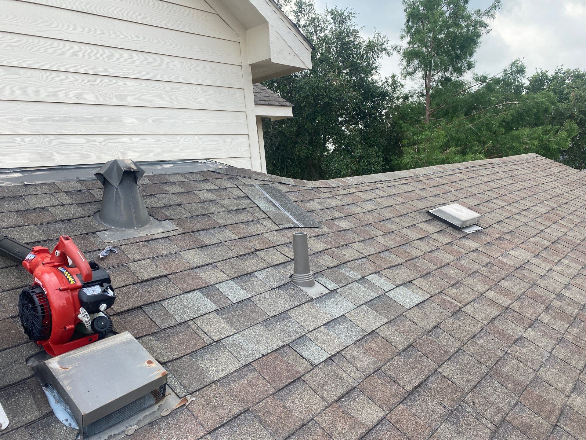 Hail Damage using Owen's Corning Duration (Lifetime) Shingles by Roof Repair Company
