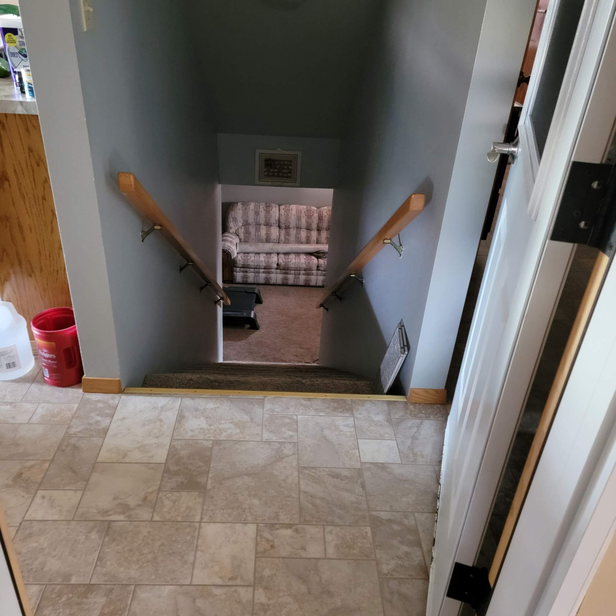 Full Garage and Basement Epoxy Floor Coating in Winner by Select Painting, Coatings & Garage Cabinets