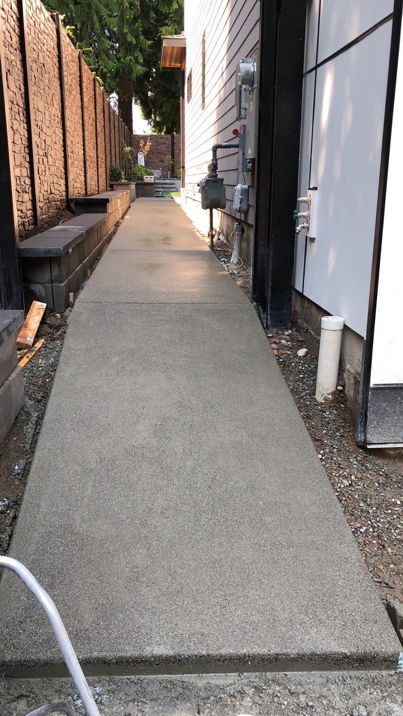 Bruce | Broom Finish Driveway, Concrete Project by Jireh Asphalt & Concrete Inc 