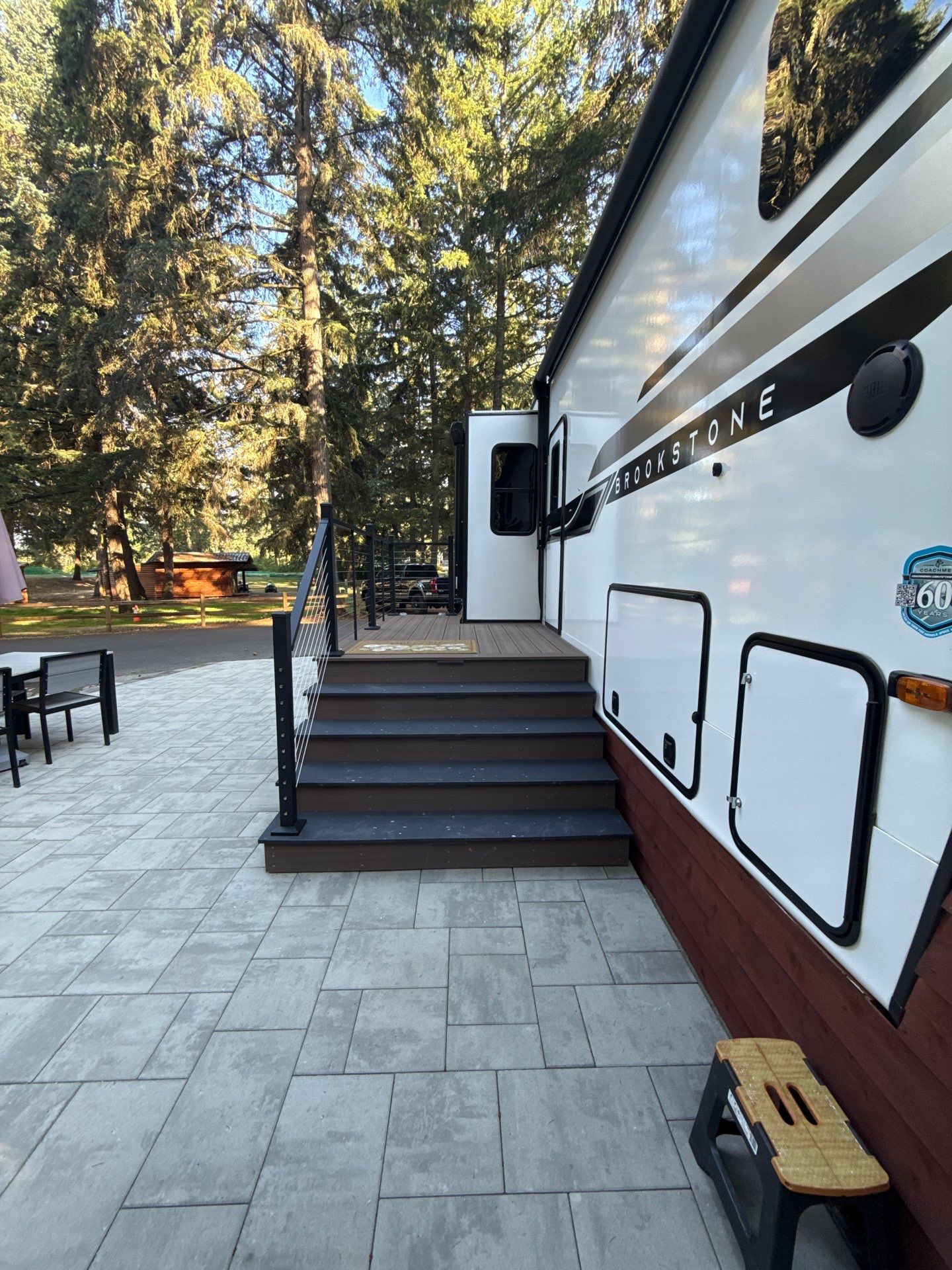 Custom Composite Deck with Cable Railing and Paver Patio in Olympia by Expedeck