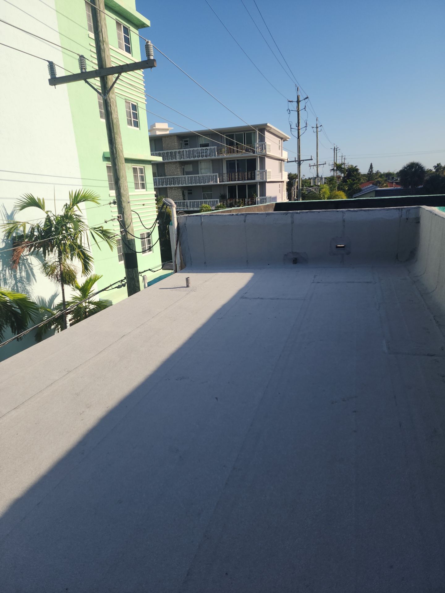 Flat Roof Replacement and Insulation Upgrade in Lake Worth Beach by Aastro Roofing