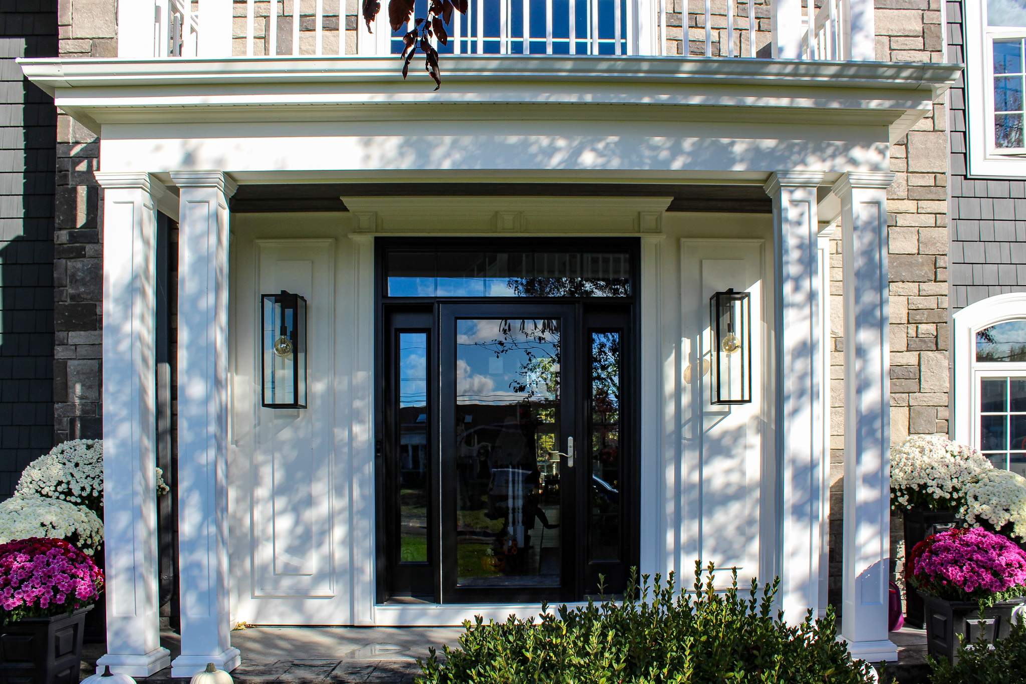 Exterior Renovations- Siding, Concrete, Railings, and Entry Door  by Ivy Lea Construction