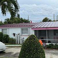 24ga 1.5" Mechanical Seam Burgandy  by Total Roofing System The Metal Roof Experts