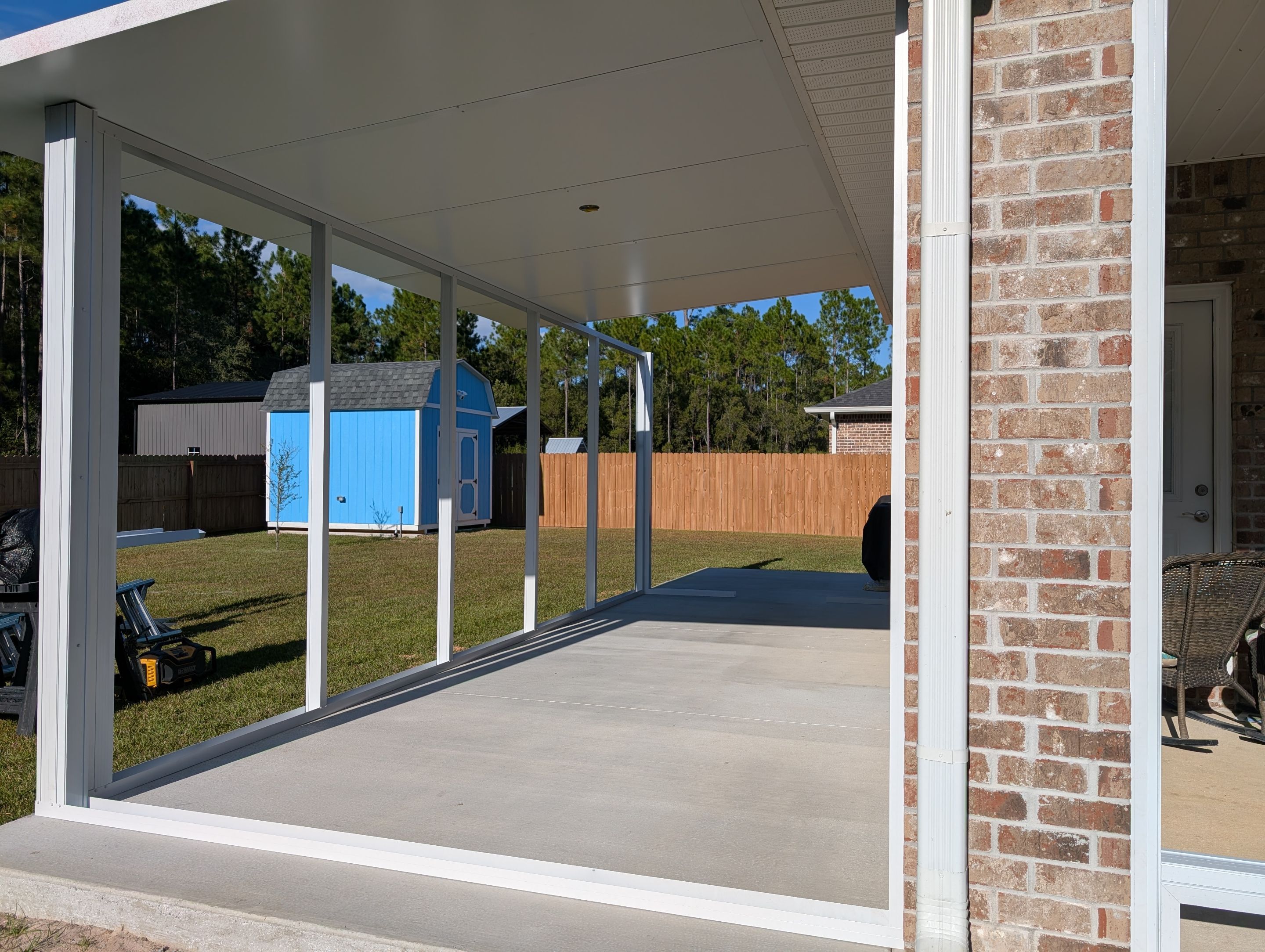 Home addition w/Vinyl 4-Track Windows by Titan Sunrooms