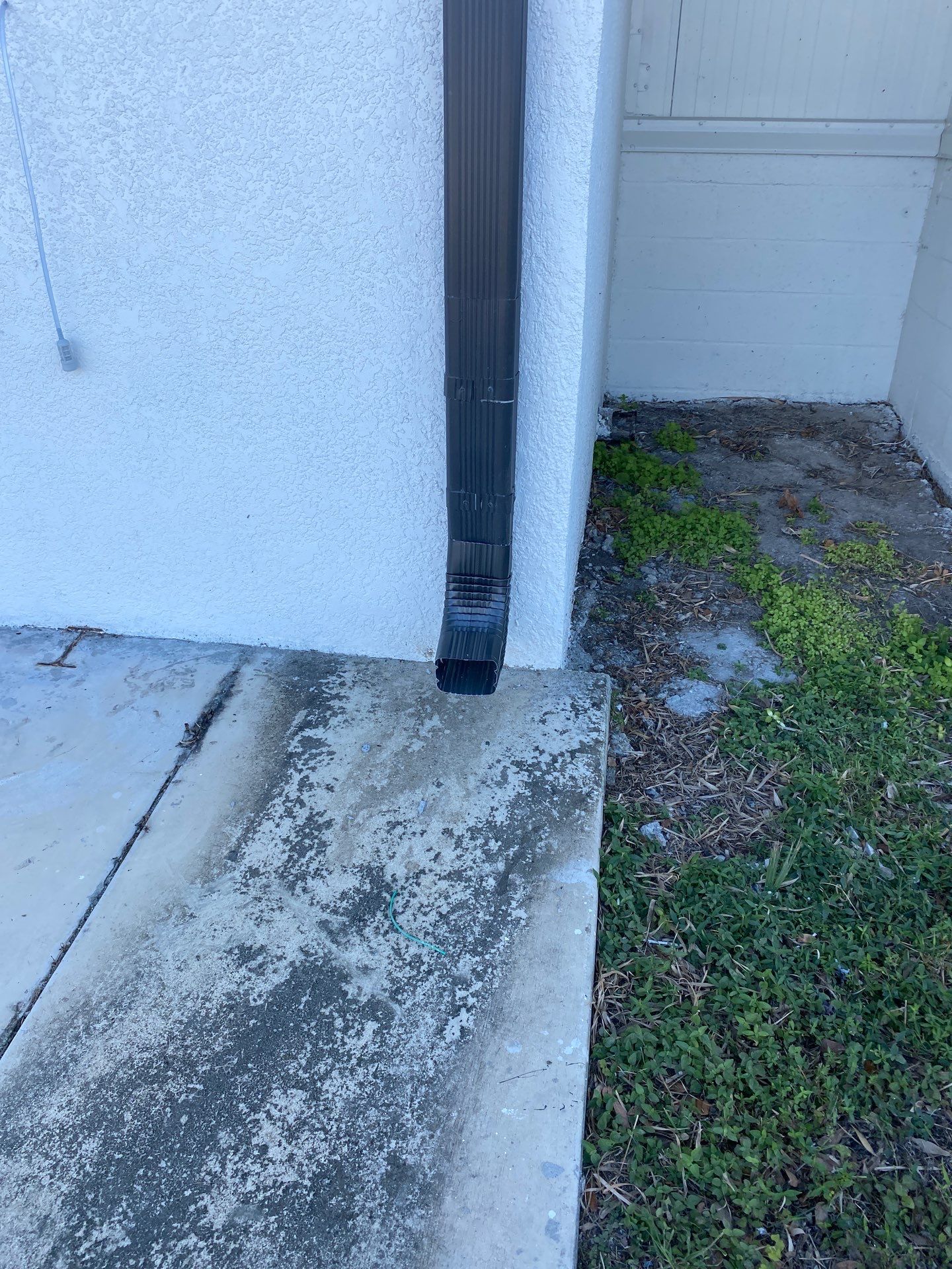 Black Seamless Gutters for Modern Homes in Sarasota FL by Gutter Professors