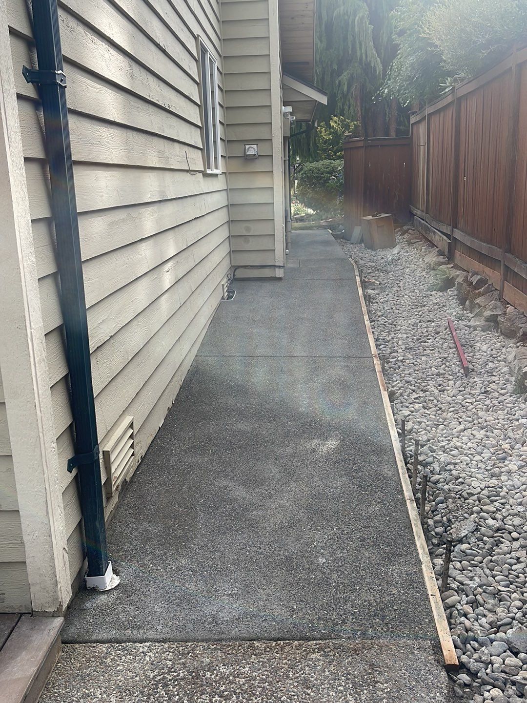 Joan | Concrete Driveway & Walkway   by Jireh Asphalt & Concrete Inc 