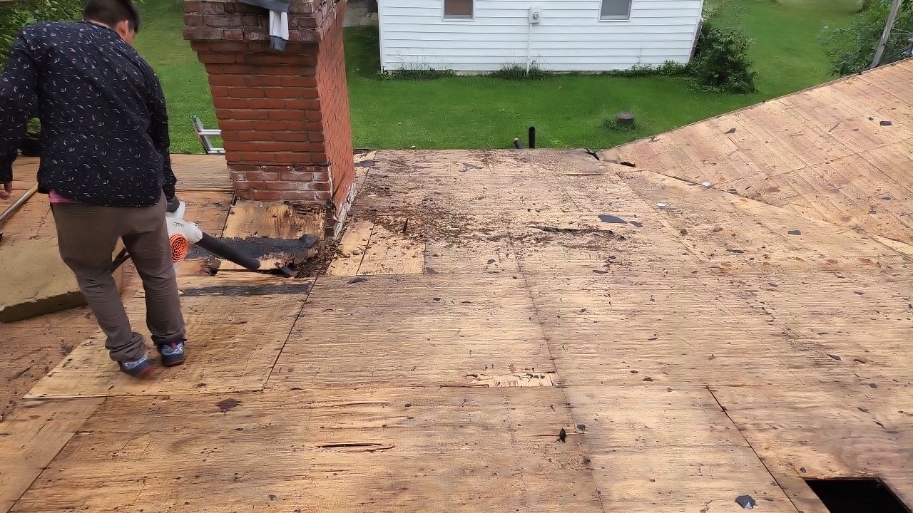 Residential Roofing Installation using 60 mil rubber roof  by Nitro Roofing and Construction
