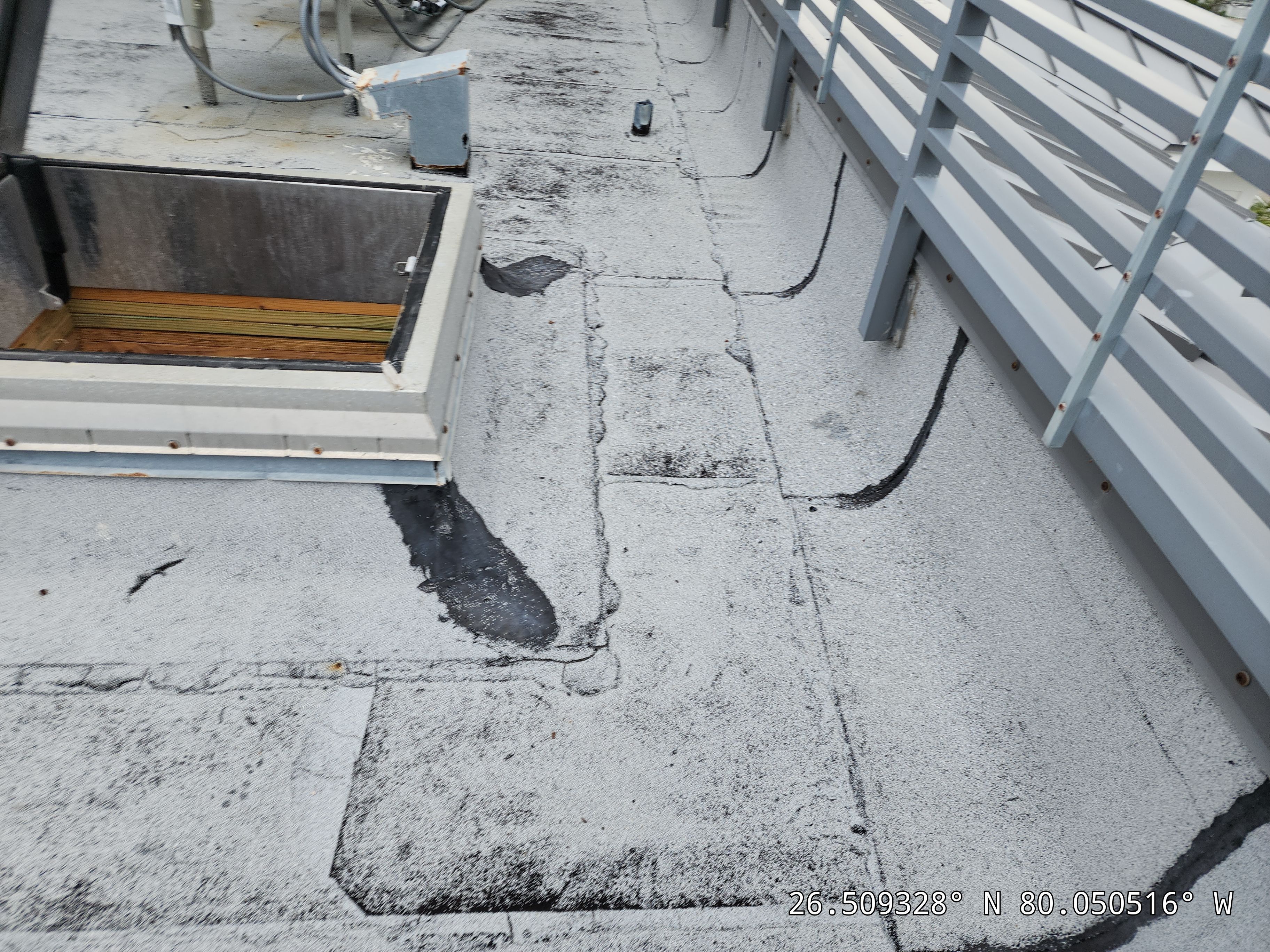 Flat Roof Silicone Coating and Drain Repair in Ocean Ridge by Aastro Roofing