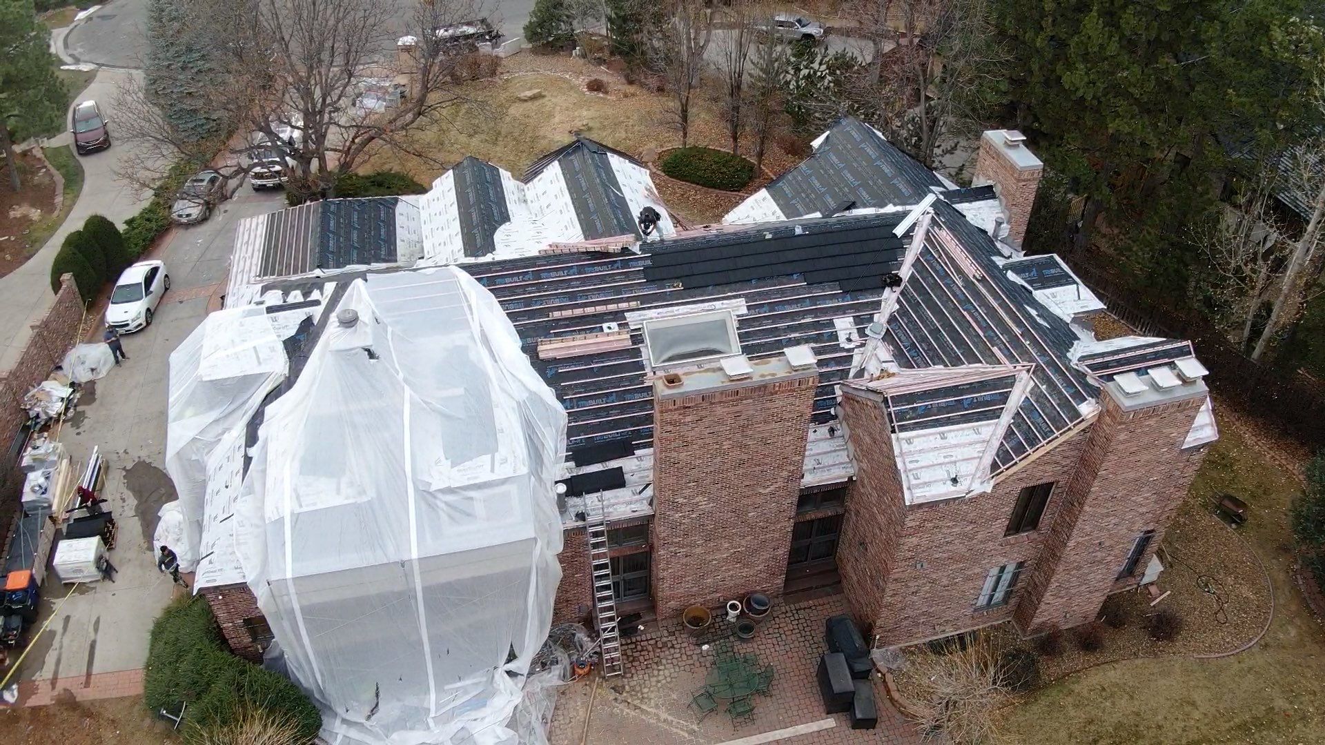 Unified Stone Coated Roof & Stucco Remodle by Blue Peaks Roofing LLC