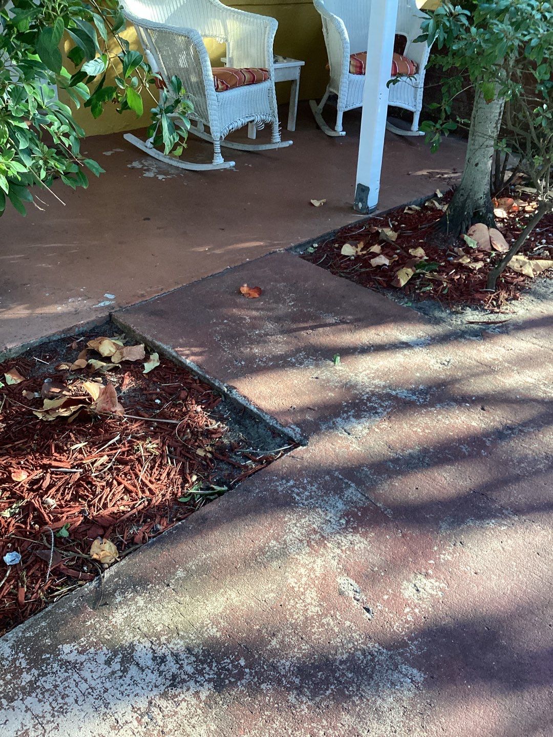 Sidewalks and Porches using Chestnut by Amvet concrete coatings llc