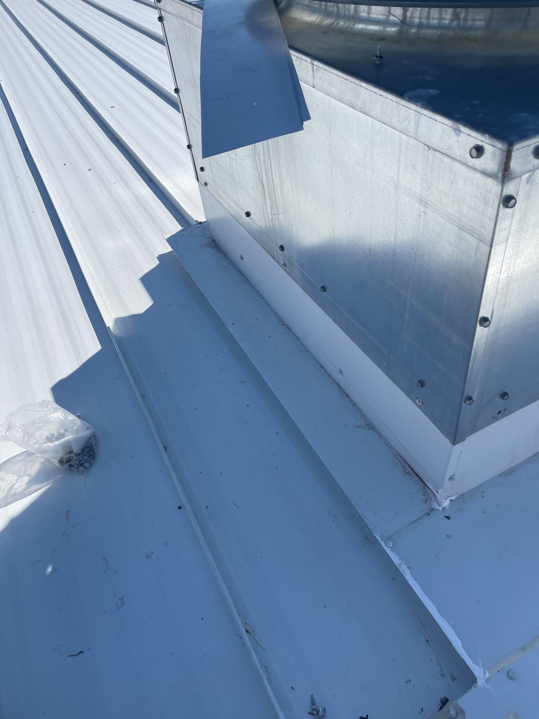Commercial Roofing Installation using 24 Guage Double Lock Standing Seam by CentiMark Roofing