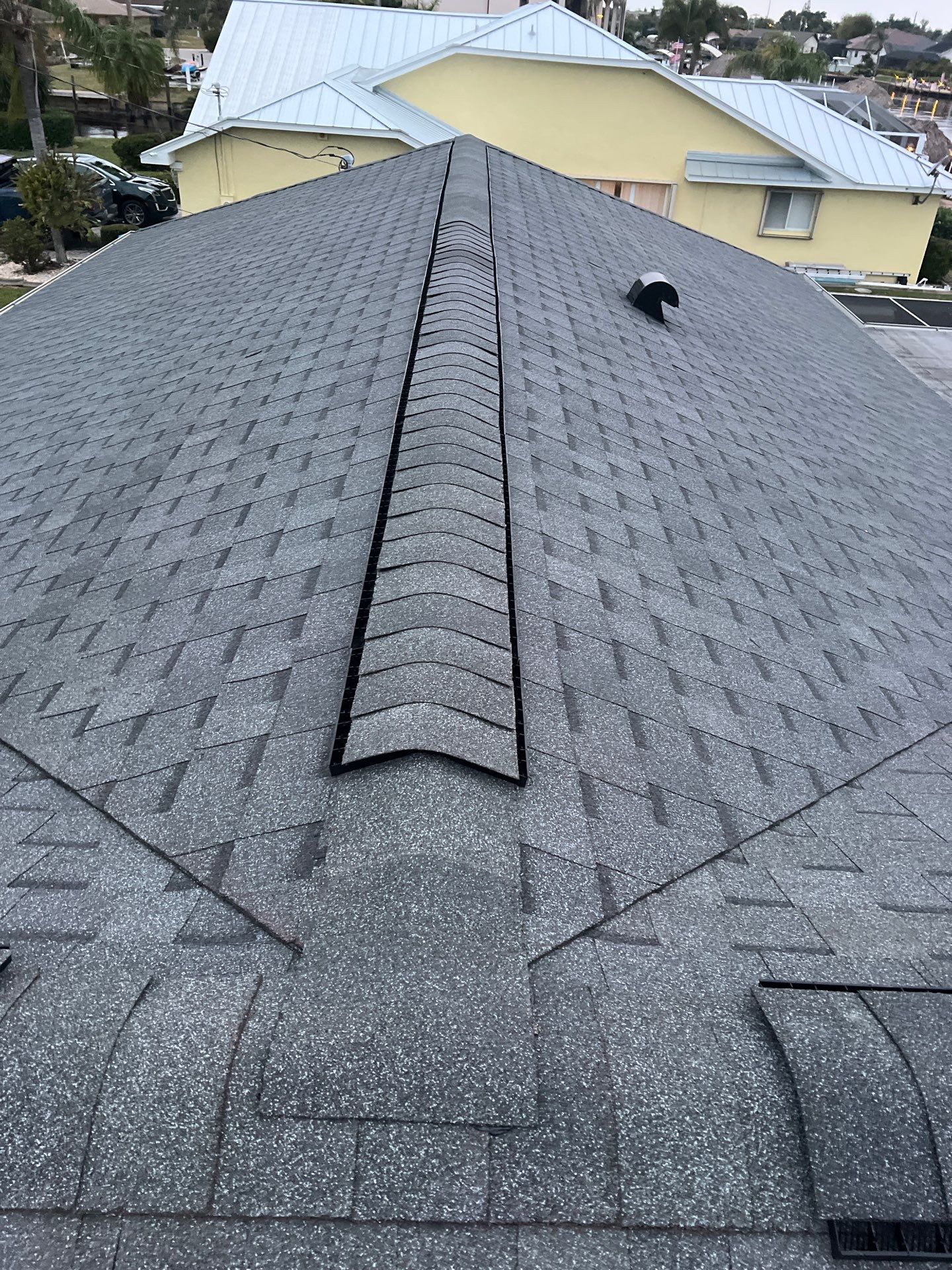 Residential Roofing Installation using Pinnacle Pristine Shingle in Pewter Gray by Durabilis Roofing INC