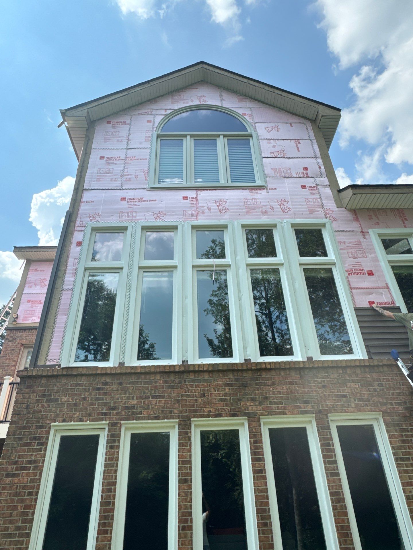 Siding Replacement using Alside Odyssey D4" Flagship Brown by 180 Contractors