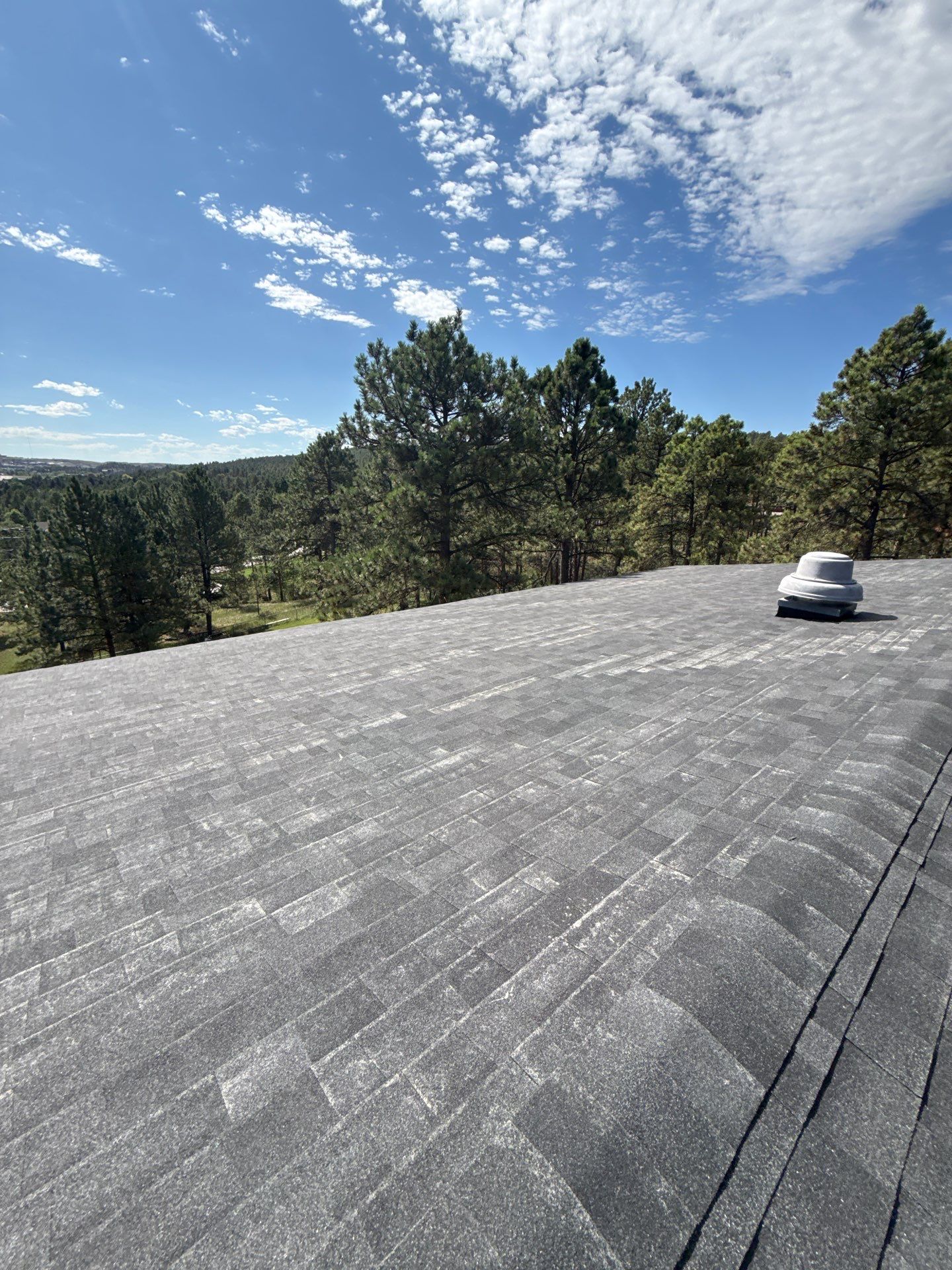 Full Architectural Shingle Installation for Contemporary Rapid City Residence by Weather-Tite Exteriors LLC