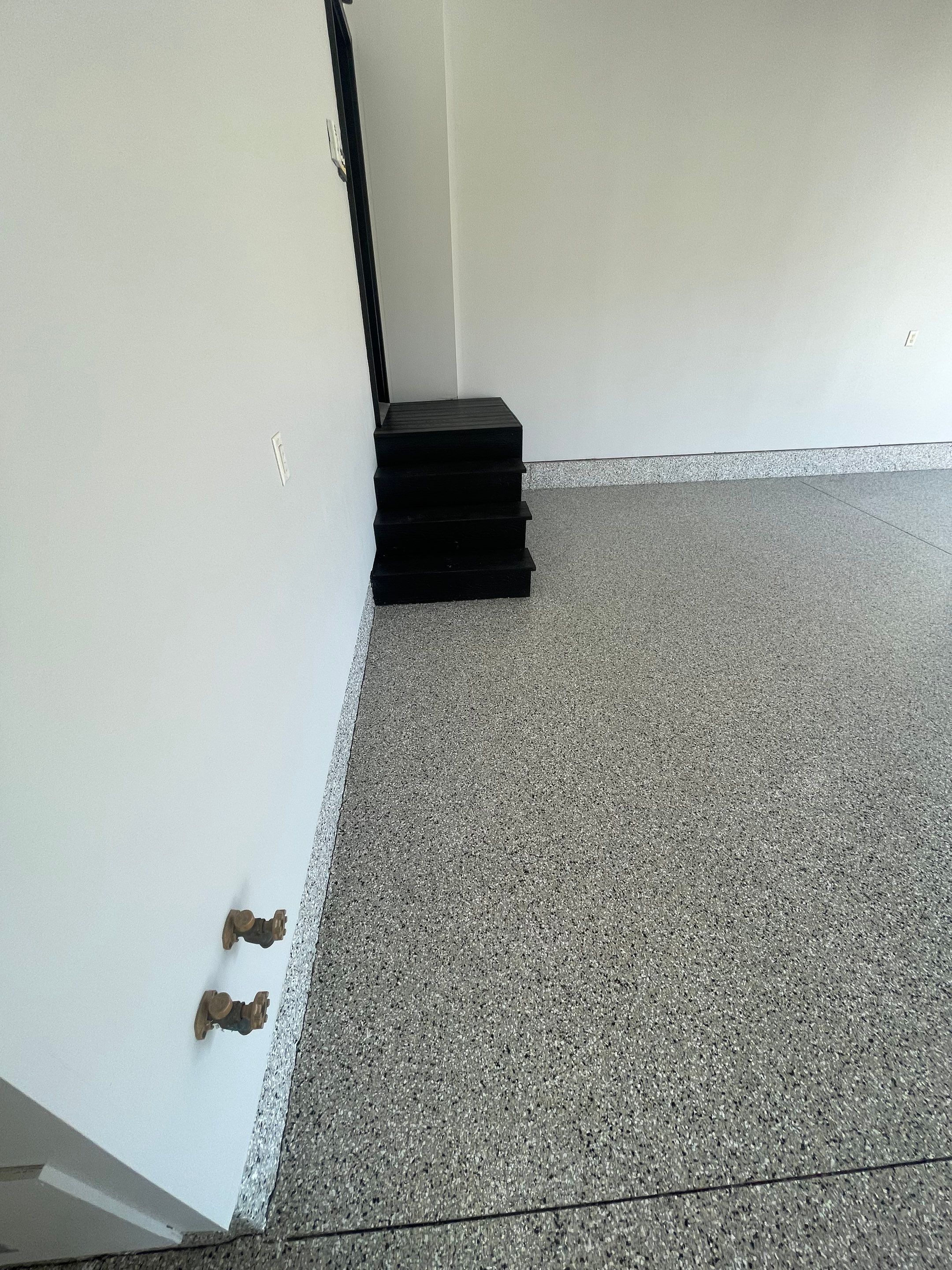 Multi-Car Garage Epoxy Floor Coating in Beresford by Select Painting, Coatings & Garage Cabinets