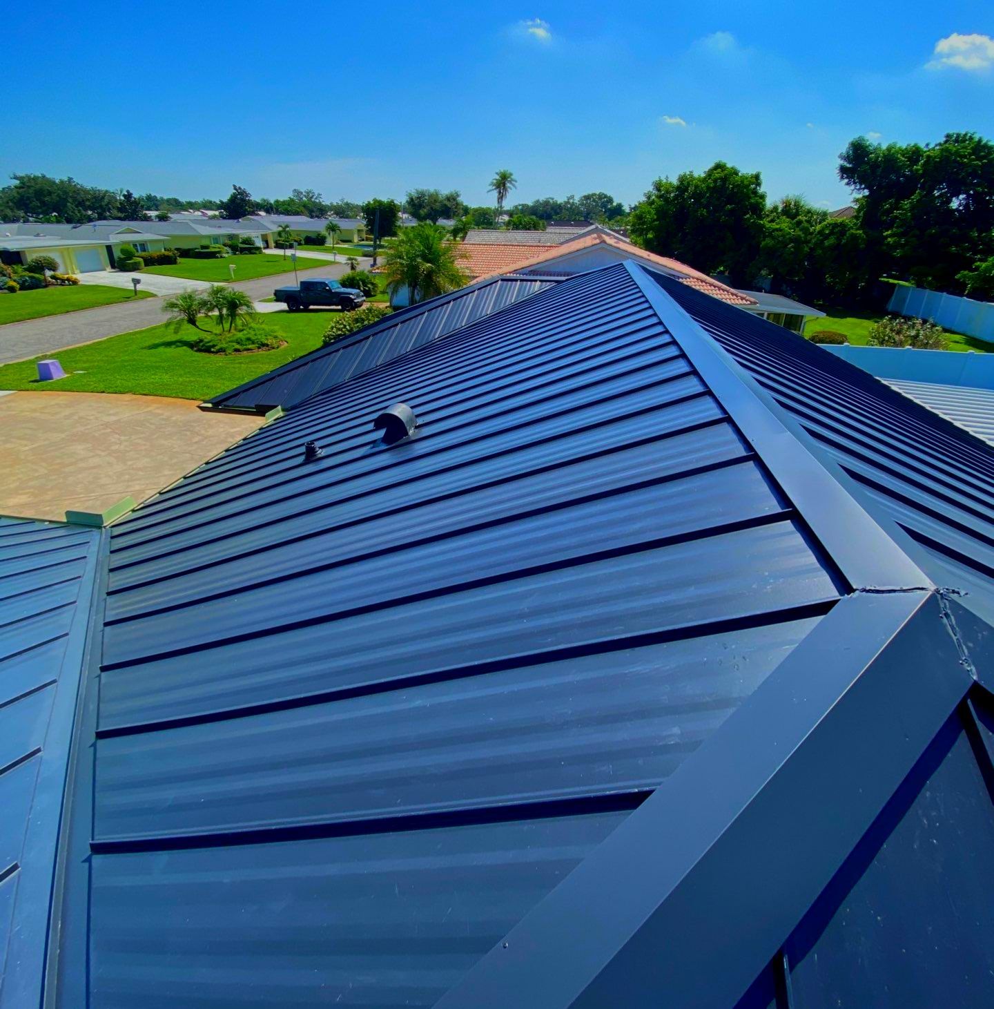 Metal Roofing System by Rooster Roofing, LLC