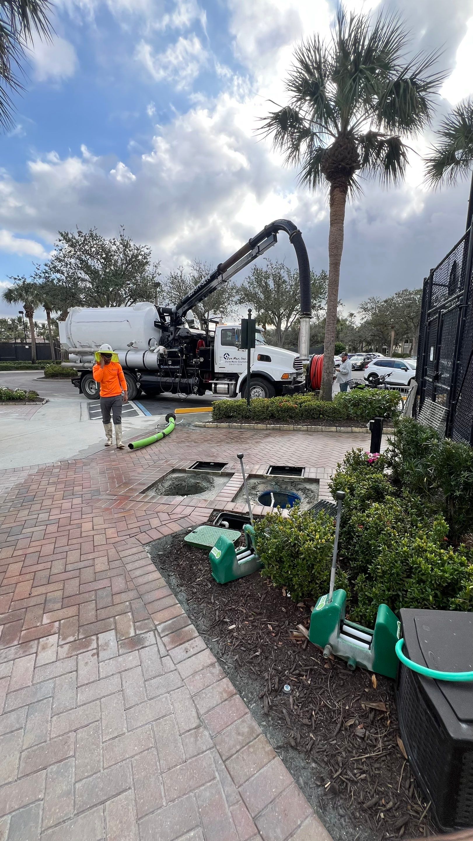 Pelican Landing Tennis Court Catch Basin Cleaning by APS Power & Water