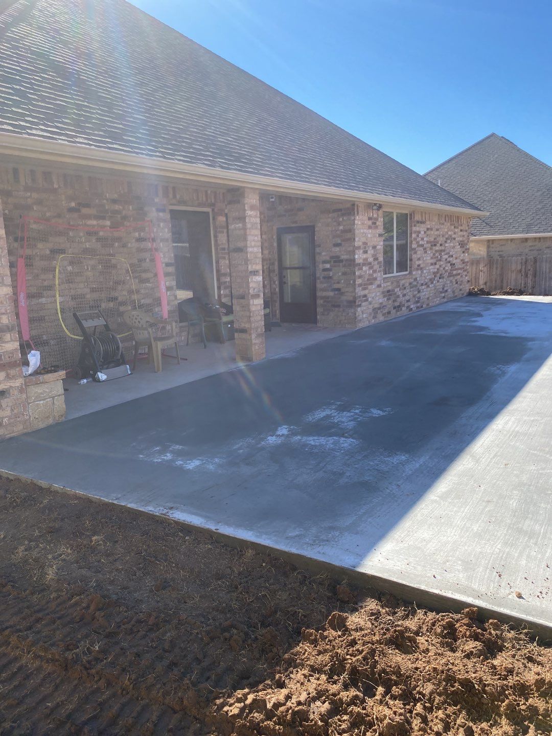 Concrete Slab , Retaining Wall , Fence, and landscape. by Clays Services Inc