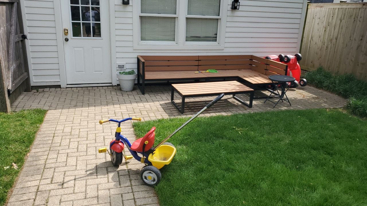 Brick patio repair, clean sand and seal by Northern Power Washing LLC.