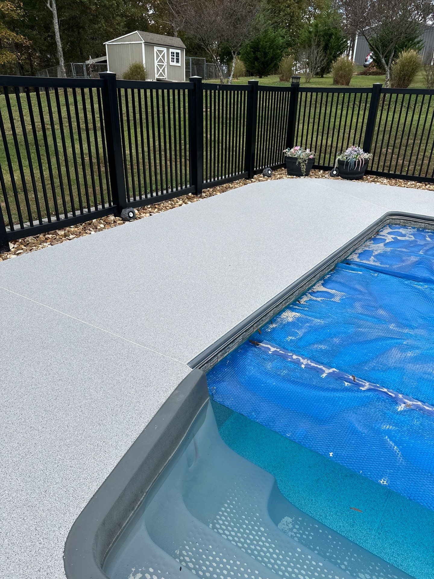 Pool Deck & Sidewalk using Quicksand & Obsidian by Elite Floor Solutions