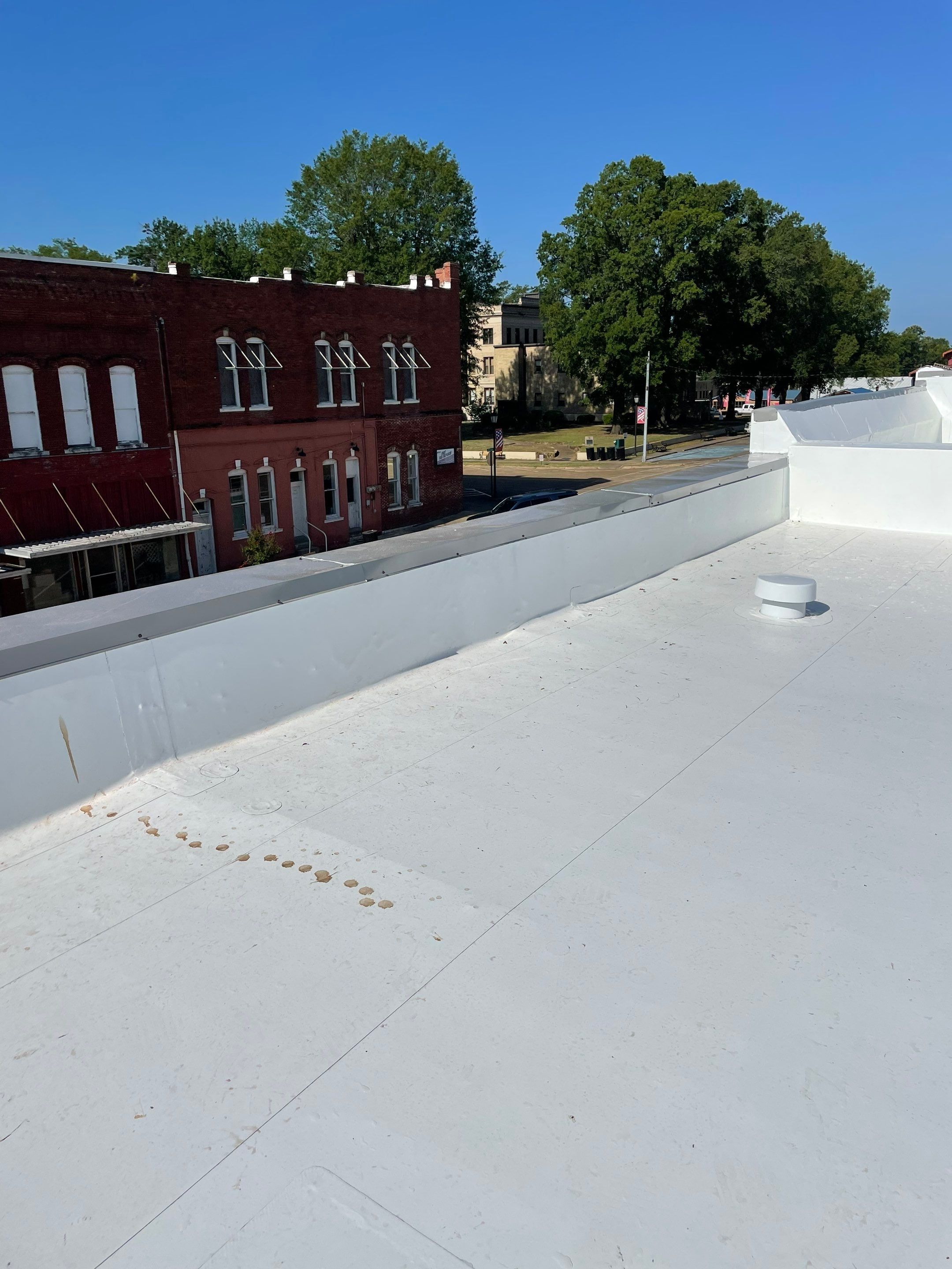 Commercial Roofing Installation in DeQueen, AR, using 50 mil PVC by Hostetler Roofing