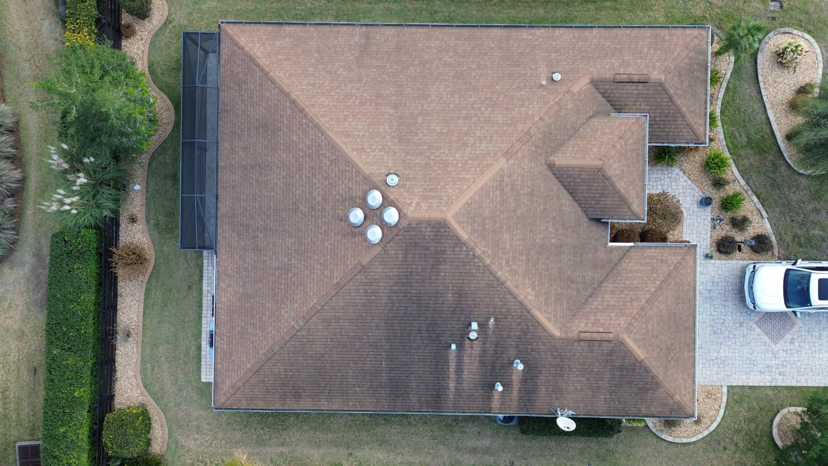 Before and after drone pictures in The Villages FL by Gold Key Roofing
