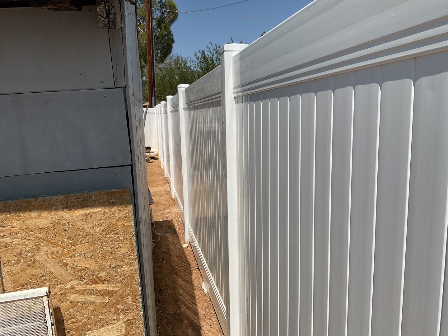 Fence replacement using 6ft and 4ft vinyl  by Fence Guys Inc. 