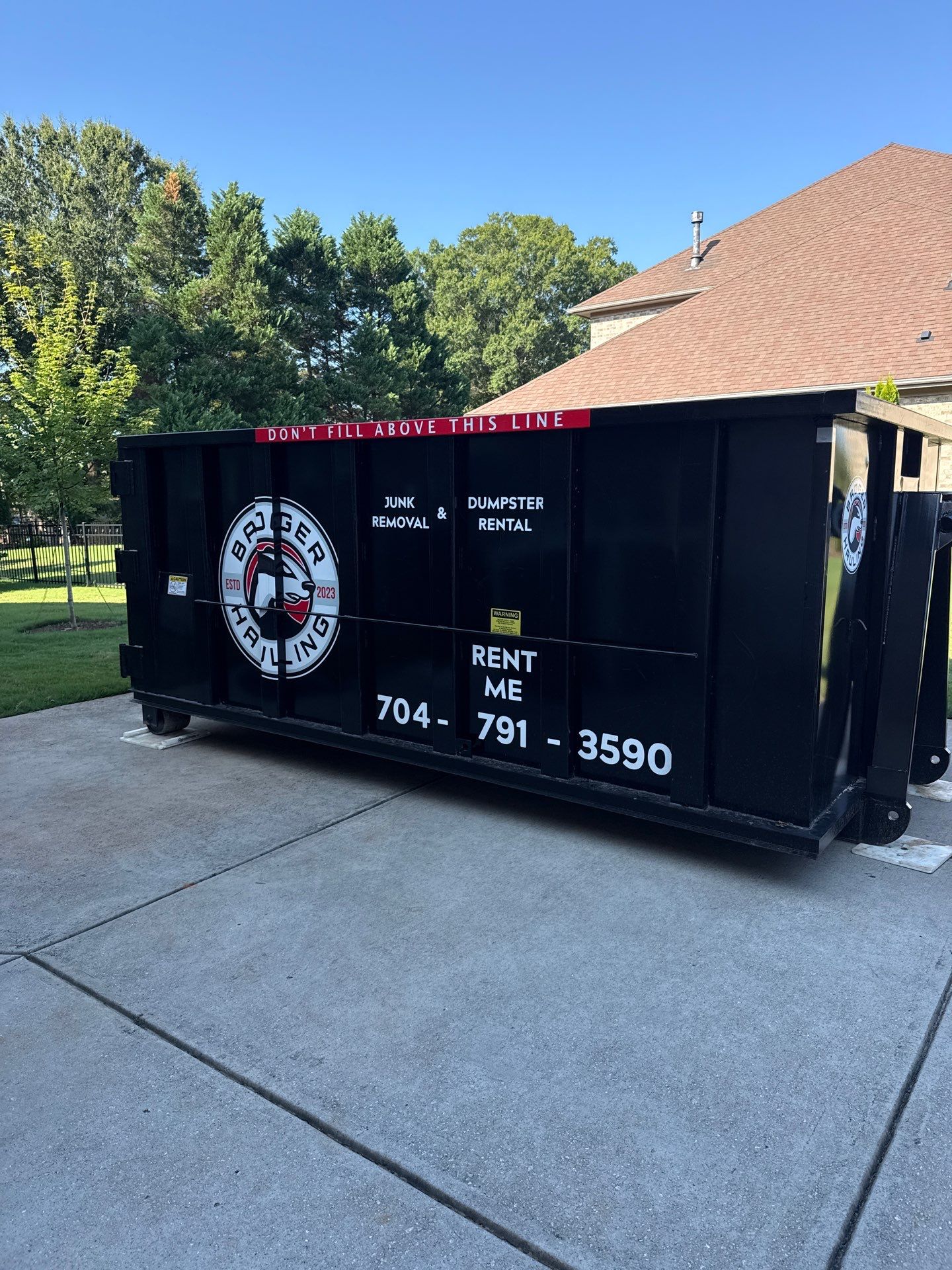 Job site clean up in Waxhaw by Badger Hauling