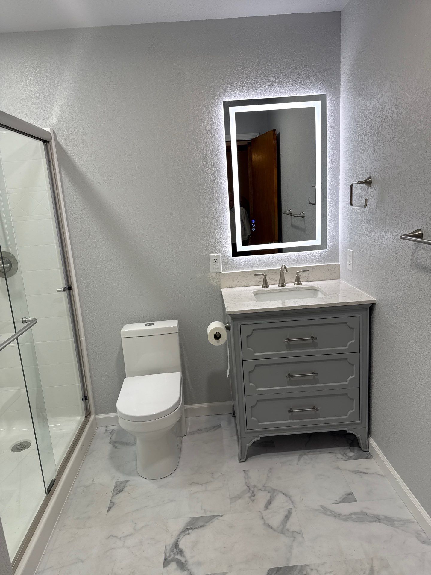 Bathroom remodel by In & Out Construction & Remodeling, LLC
