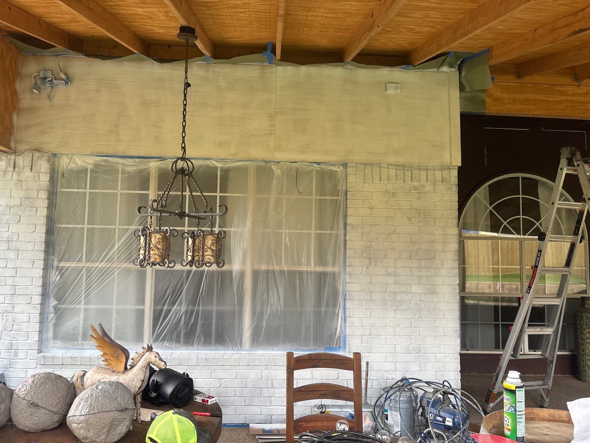 Project in TylerExterior Painting in Tyler, TX | White Brick Home, Varnished Fence & Shed Painting by Quality Coats Painting