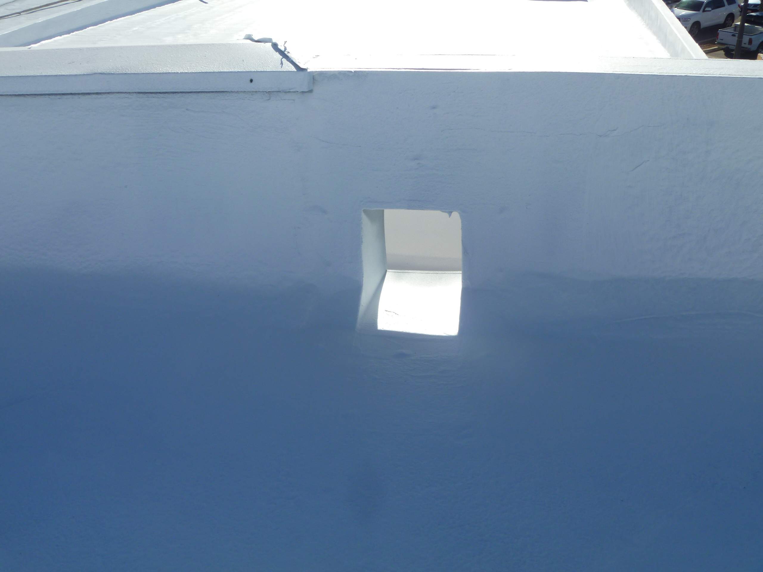 Commercial Roofing Installation using Spray foam and Conklin Benchmark/PUMA XL 18 yr warranty coatings by Straight Edge Roofing Inc