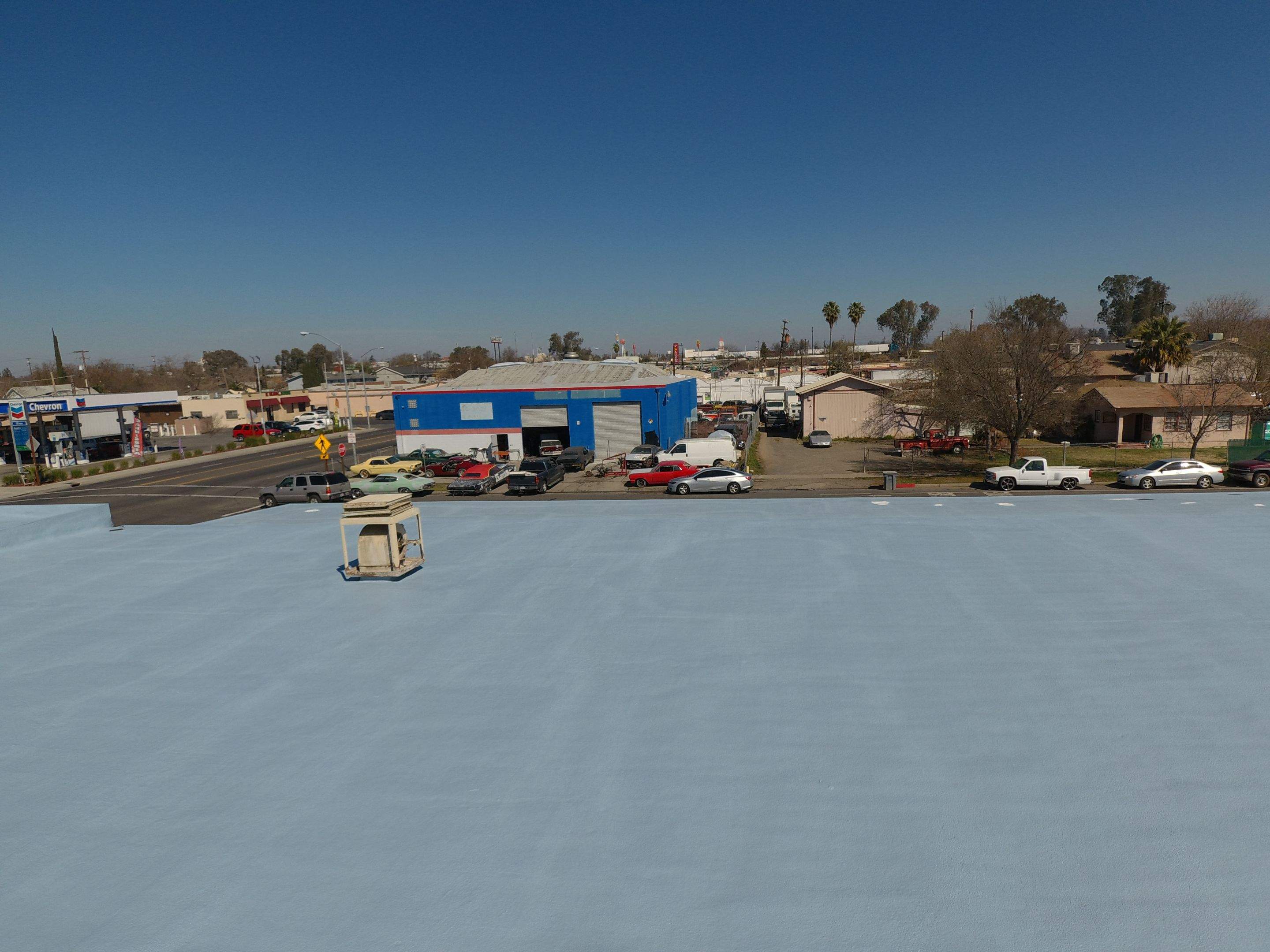 Spray foam and coatings using Conklin Benchmark/PUMA XL coatings and spray foam by Straight Edge Roofing Inc