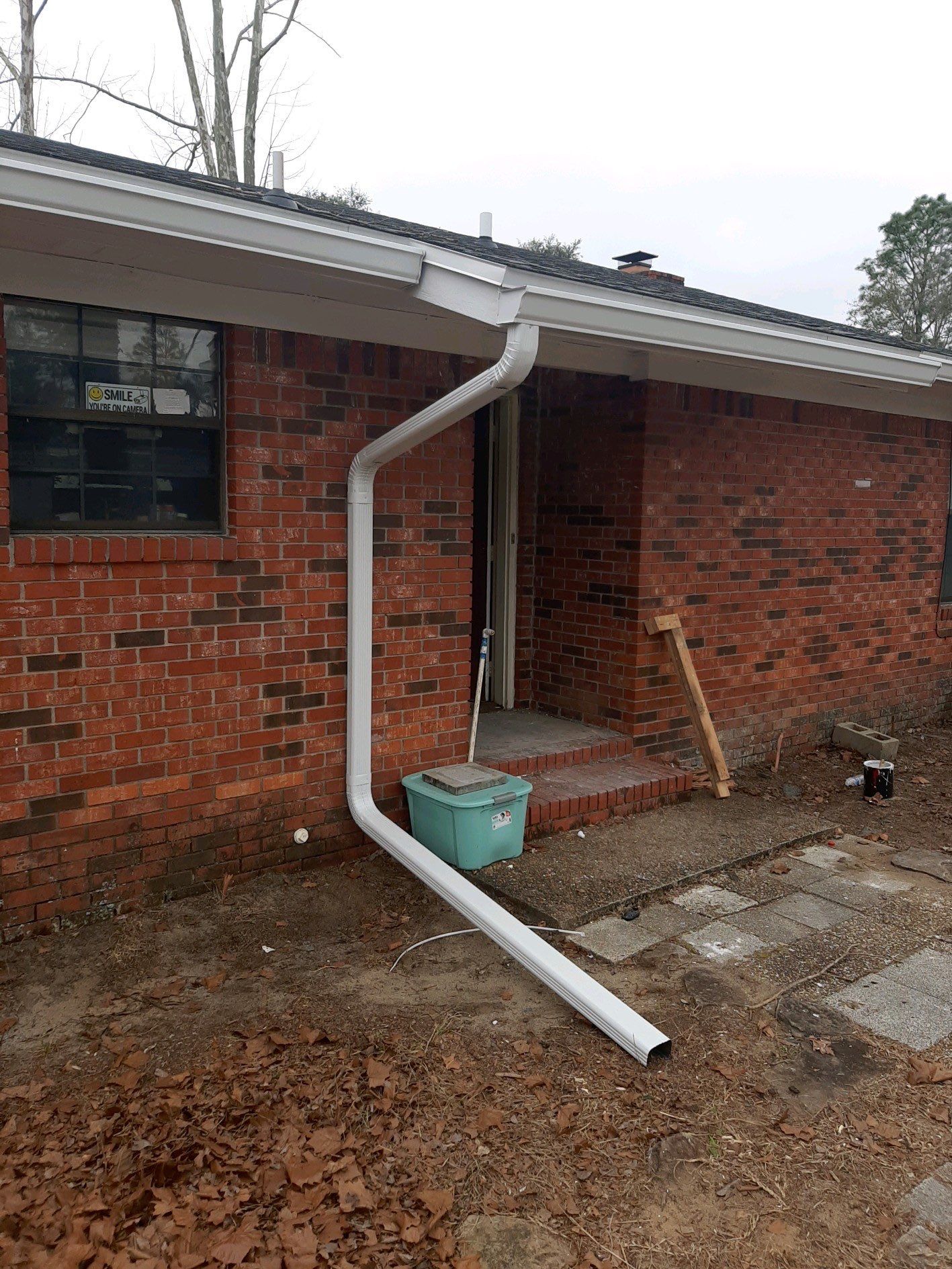 Gutter Installation using White Seamless Gutters by Gutter Professors