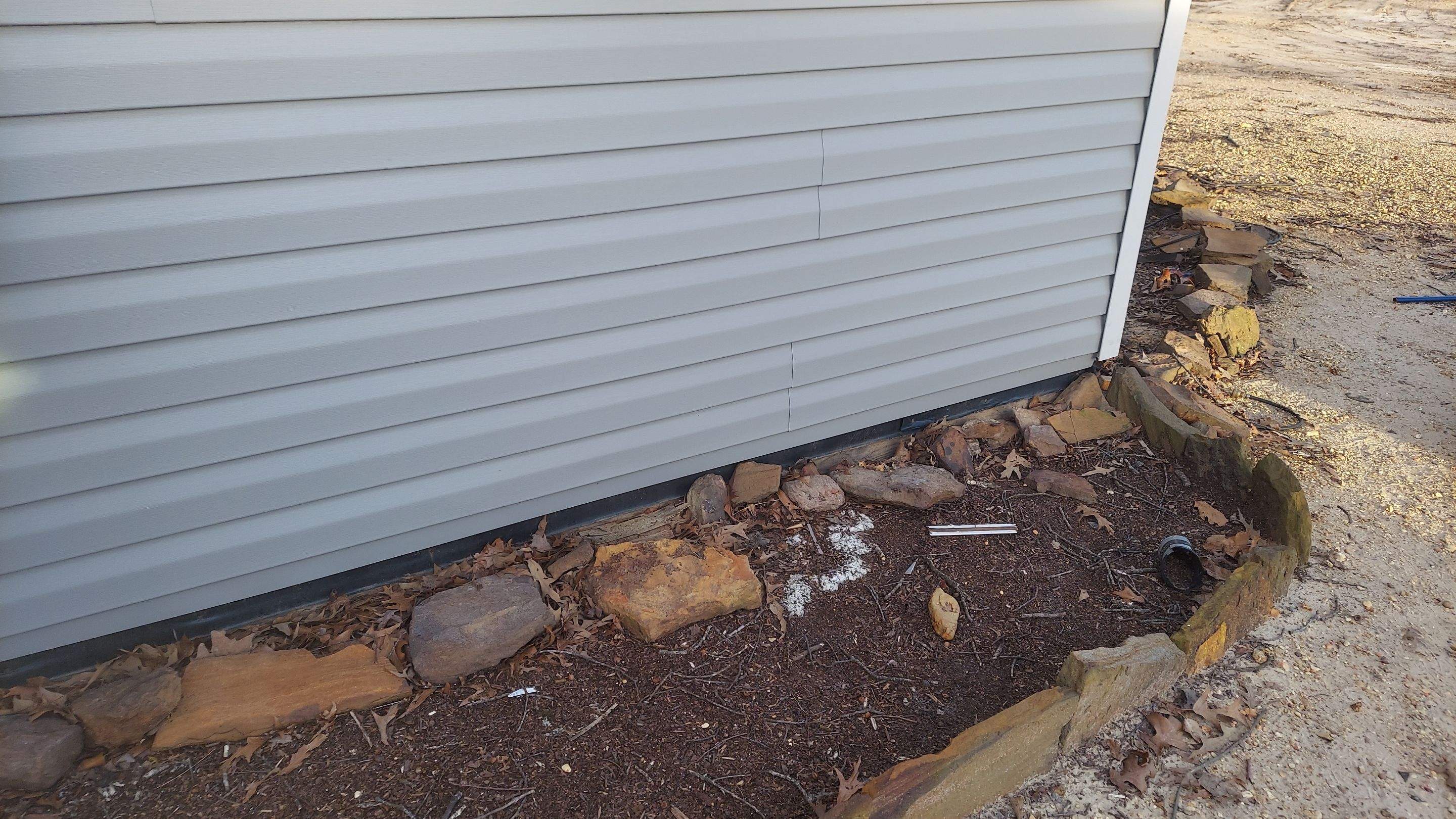 Residential Siding Repair in Bankston (Vinyl) by The Roofing Dudes