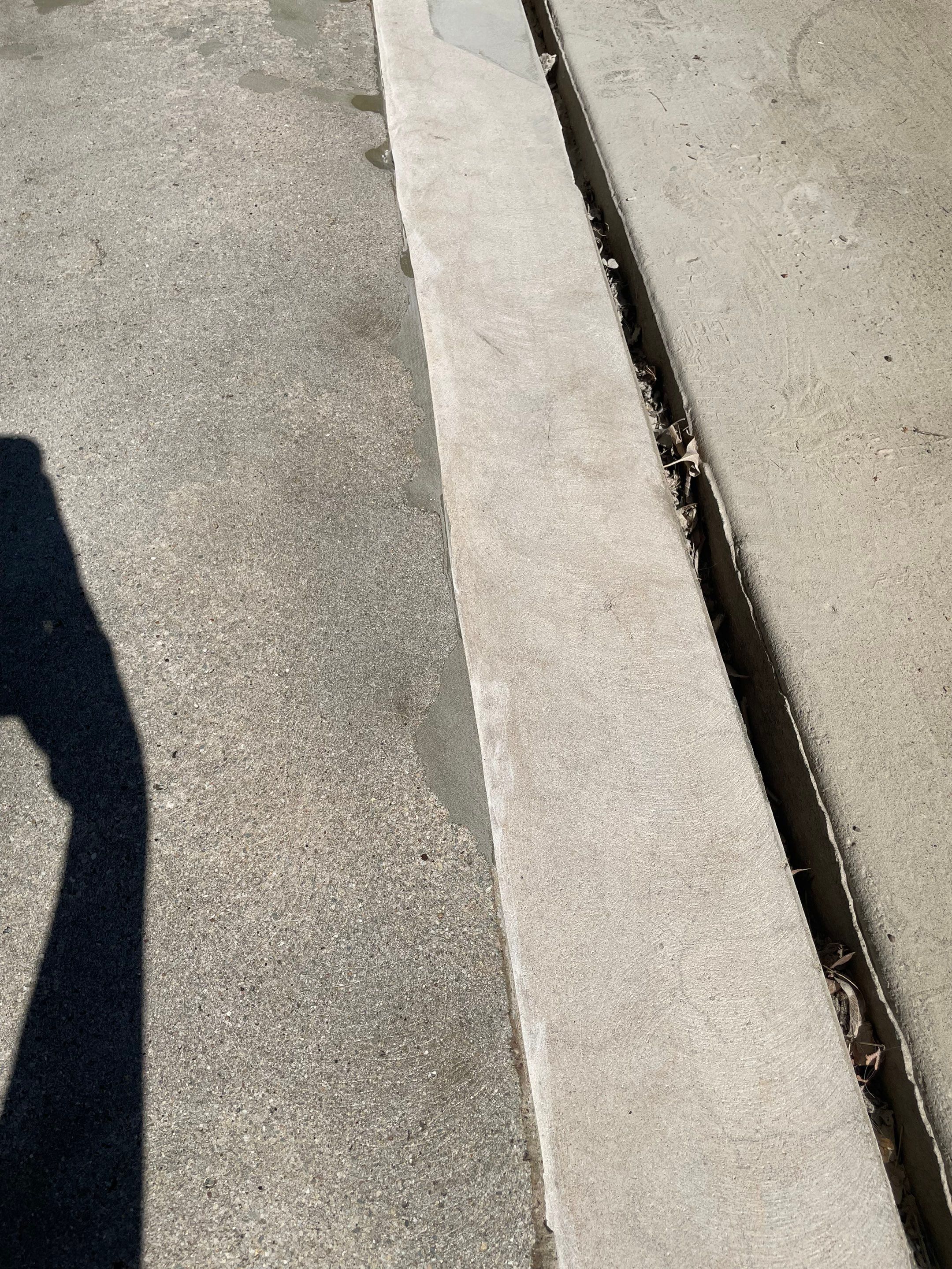 Custom Creekbed Garage Floor Coating in Sioux Falls by Select Painting, Coatings & Garage Cabinets