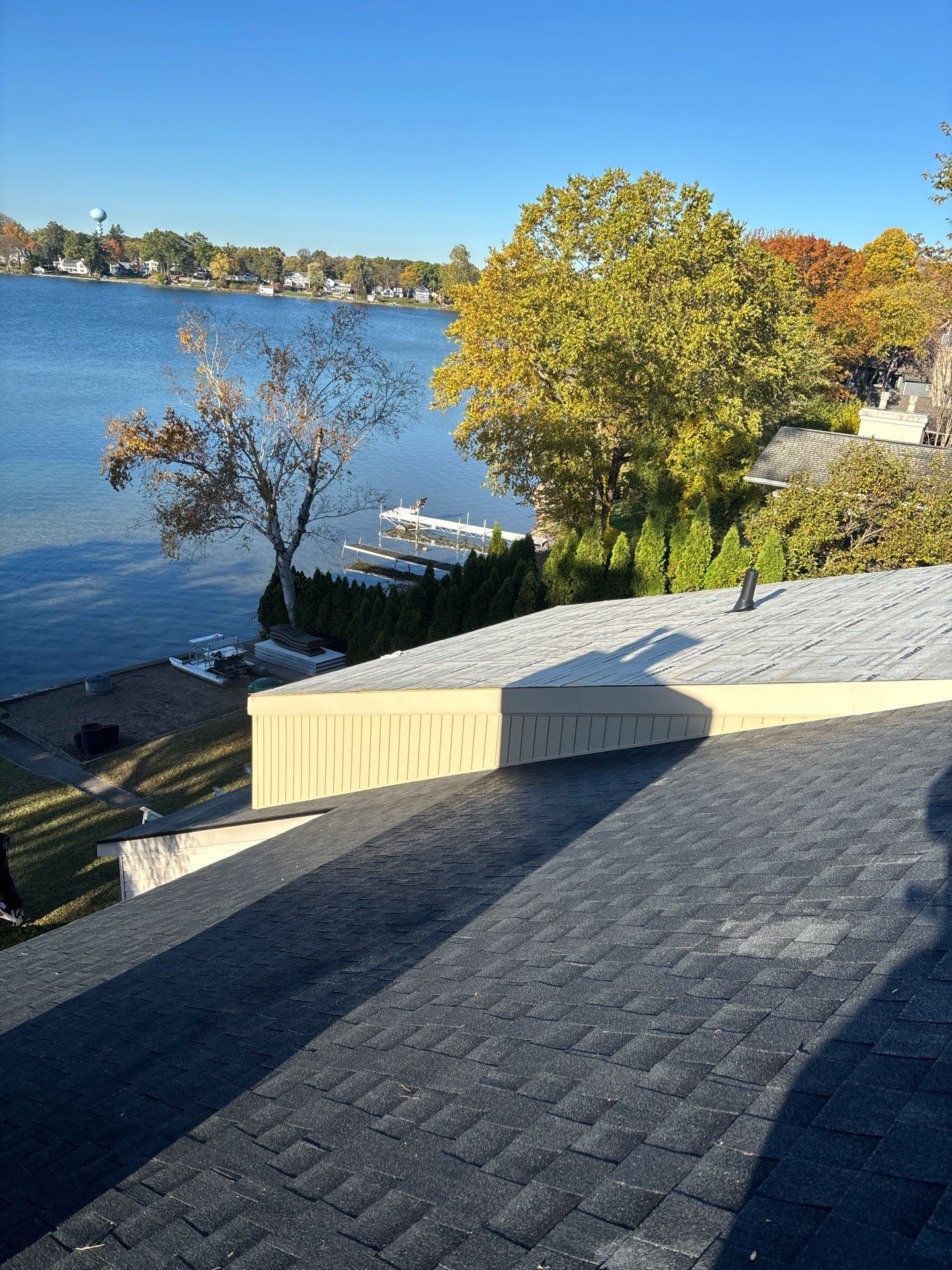 New Shingle Roof with Metal roof accents by Bloomfield Construction & Restoration