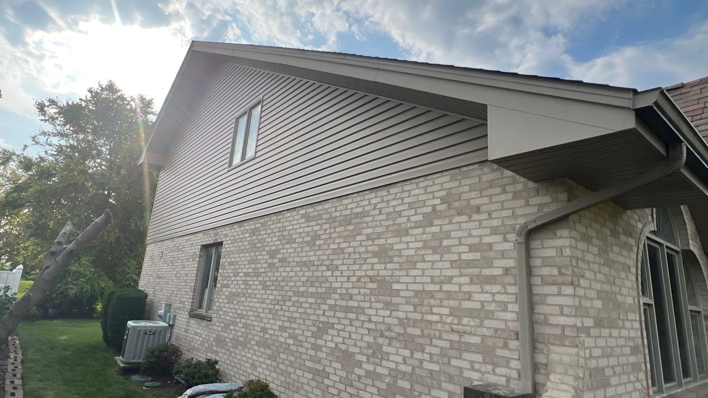 Siding replacement by Optimal Home Improvement 