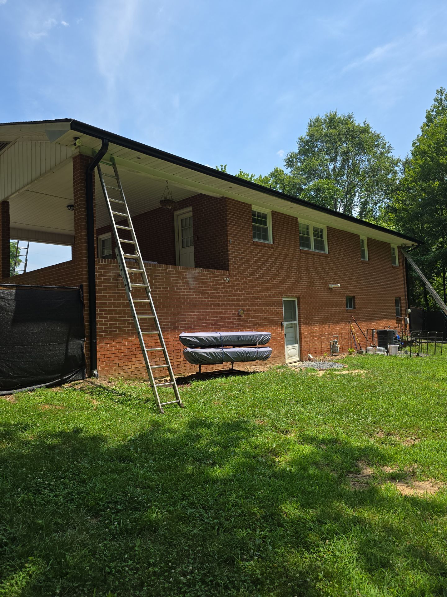Roof and gutter replacement by hail and wind damage by Just Brilliant Restoration JBR