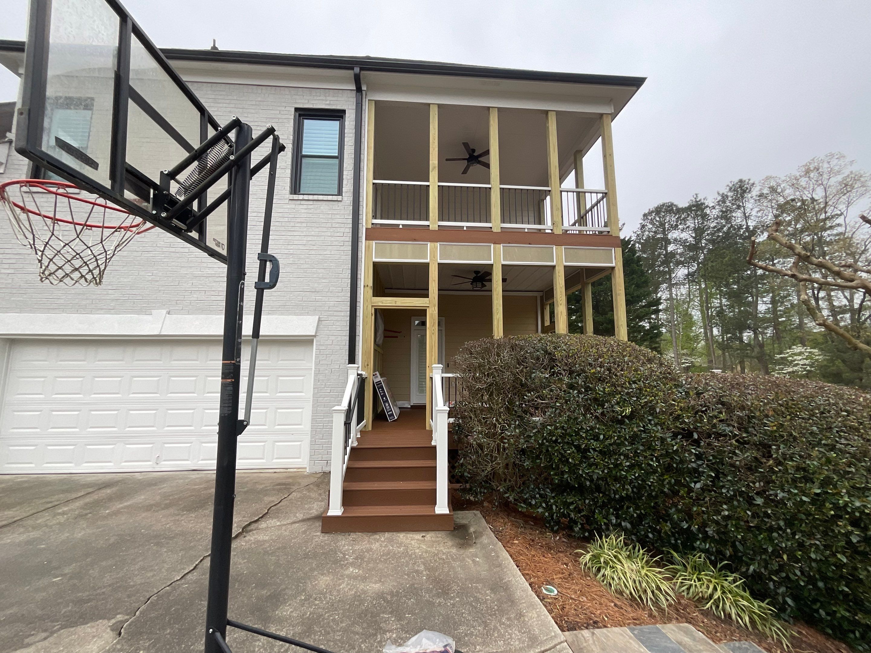 Two-Level Custom Screened Porch and Composite Deck in Alpharetta by Swift Home Renovations