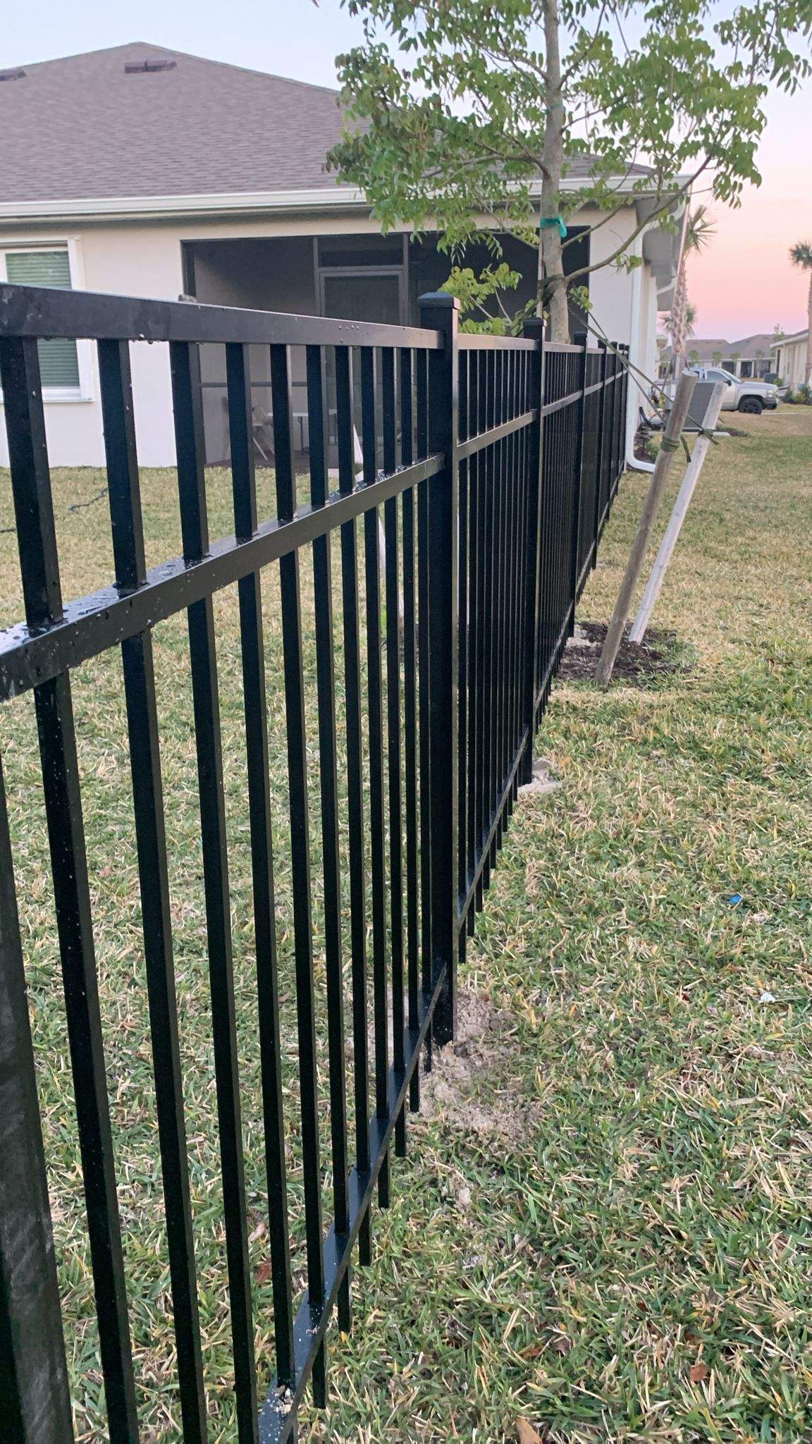 Black Aluminum Picket Fence Installation for Port Charlotte Residence by True Fence LLC
