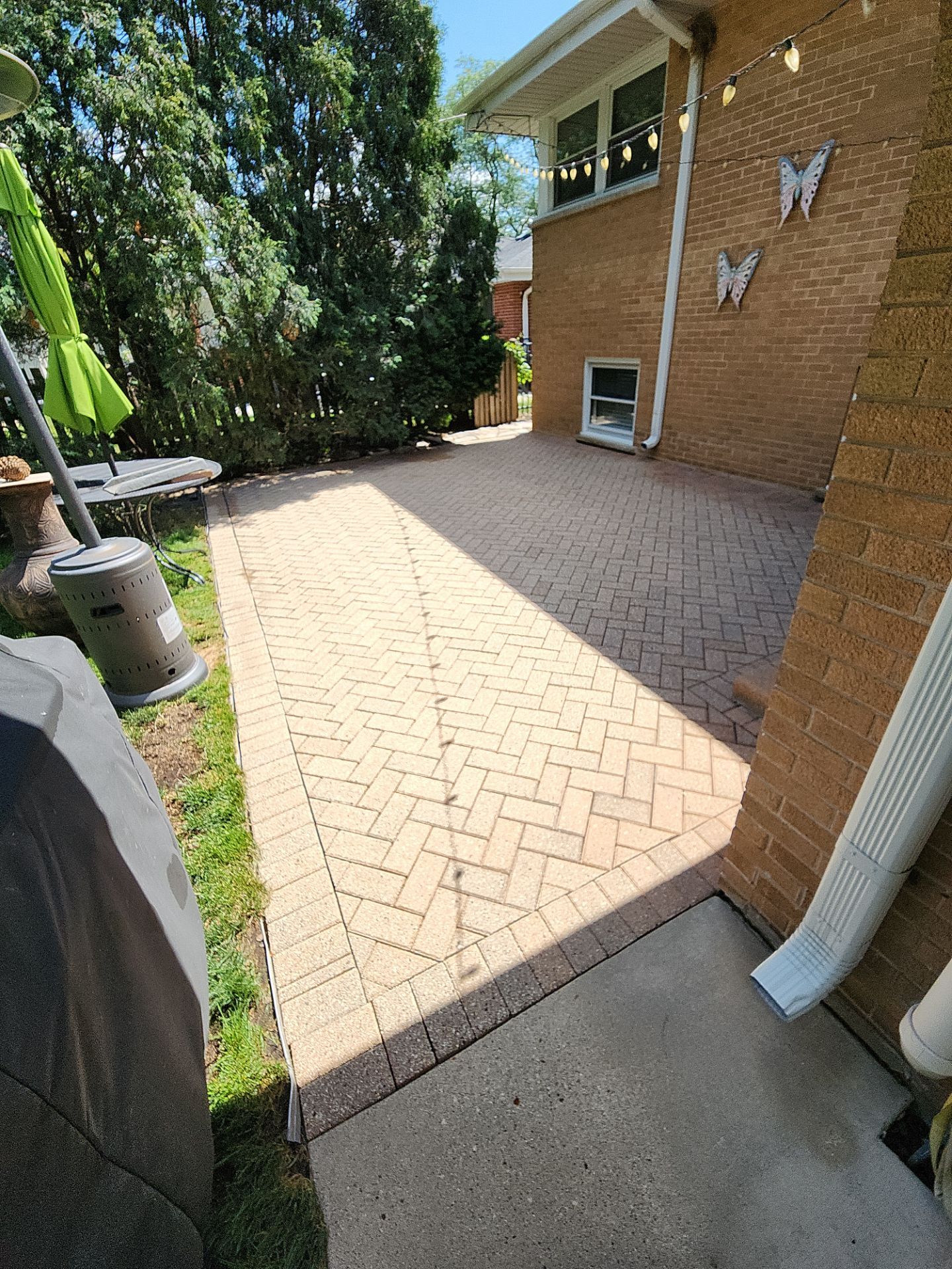 Brick paver cleaning  by Northern Power Washing LLC.