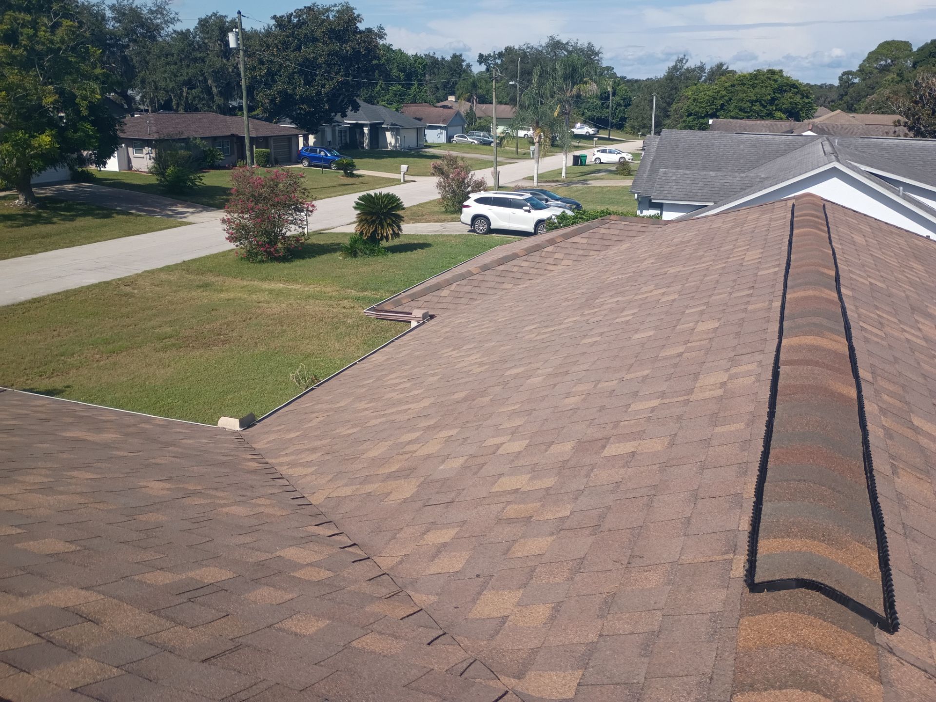 Deltona Roof Replacement Featuring Atlas Pinnacle Sun in Cool Coral Canyon by Pinnacle Roofing Group