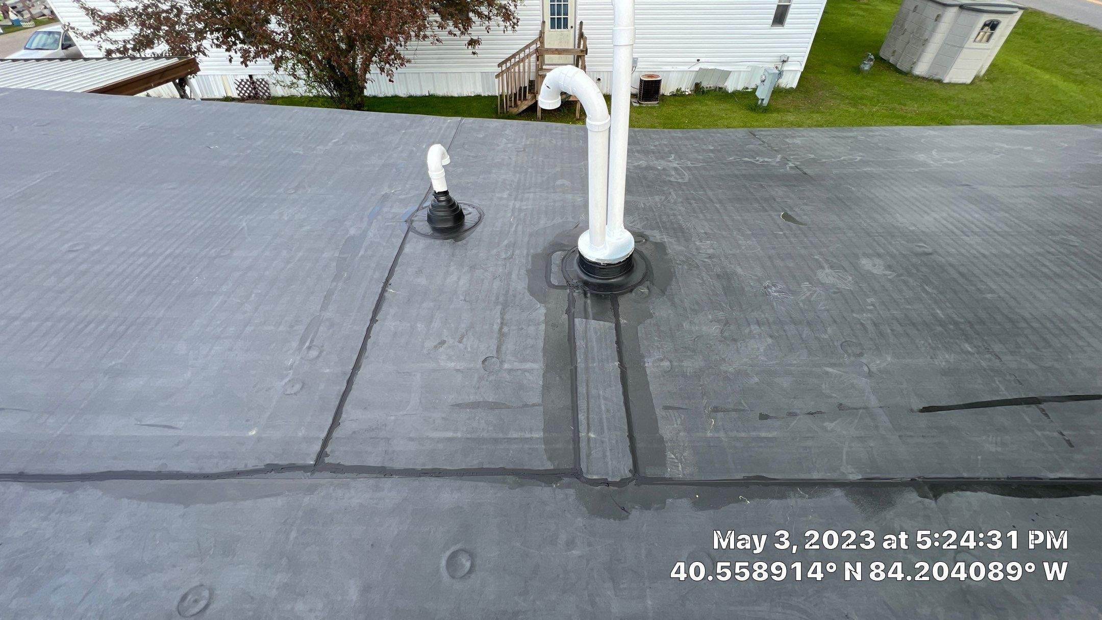 Residential Roofing Installation using 60 mil rubber roof  by Nitro Roofing and Construction