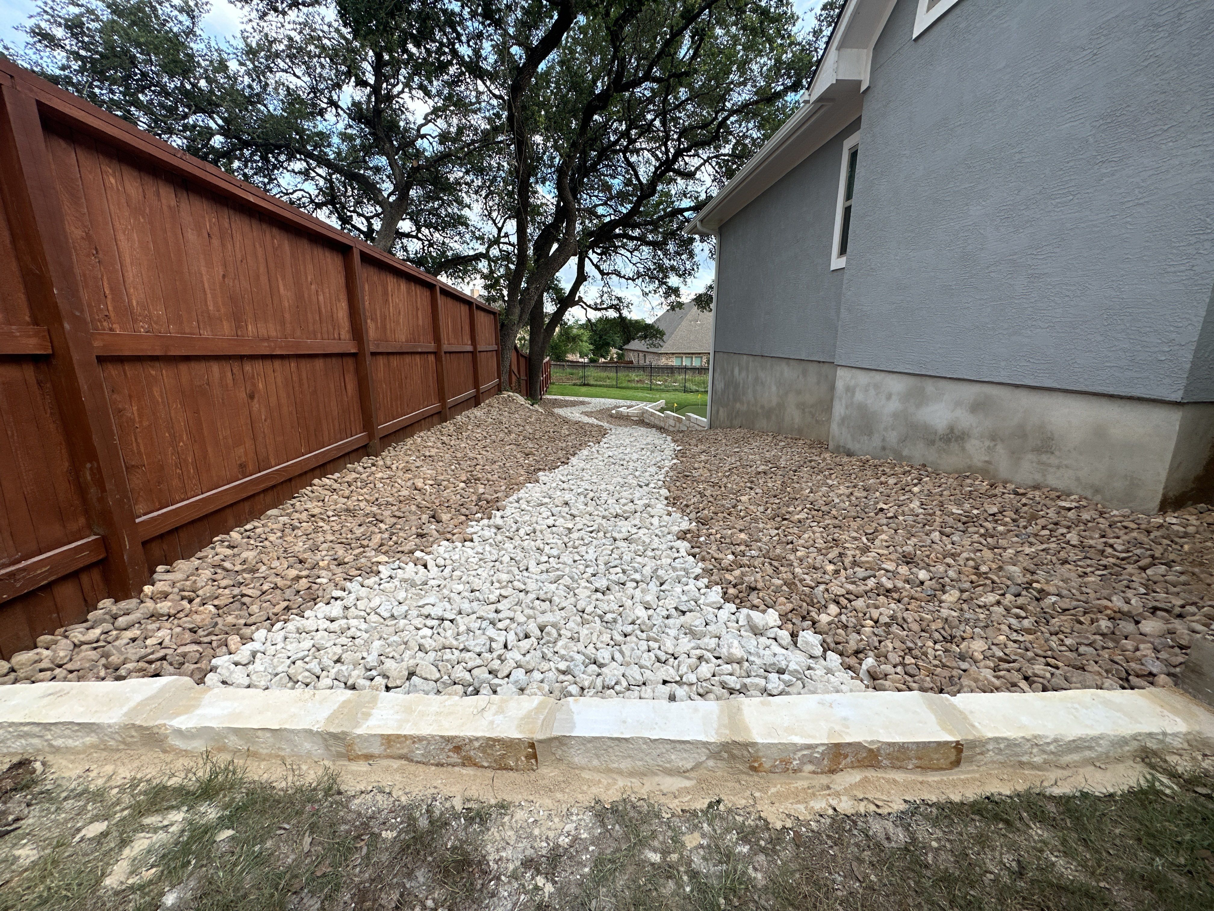 Dry Creek and Landscape Wall by Singer Services